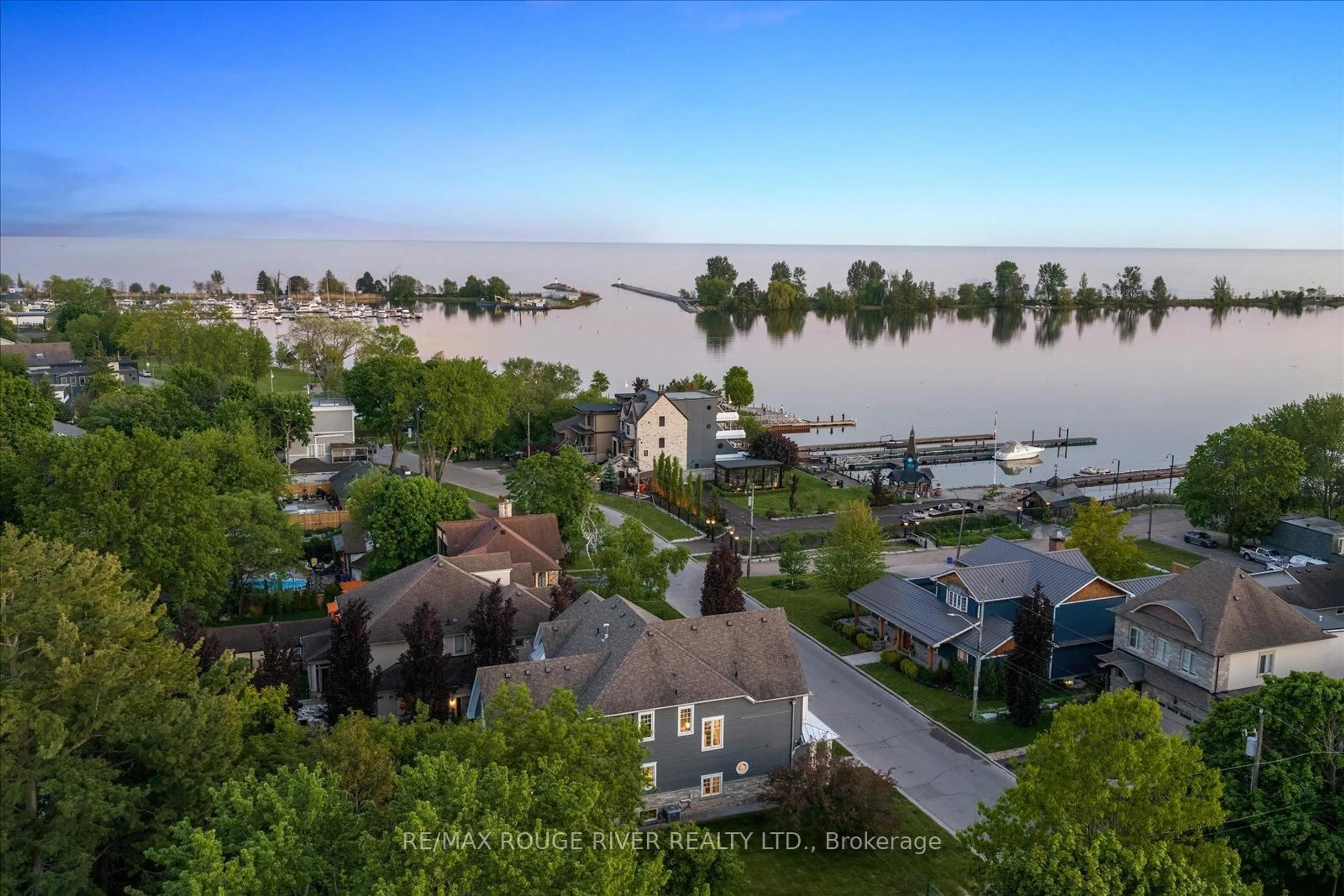 A pic from outside/outdoor area/front of a property/back of a property/a pic from drone, water/lake/river/ocean view for 699 Front Rd, Pickering Ontario L1W 1P1