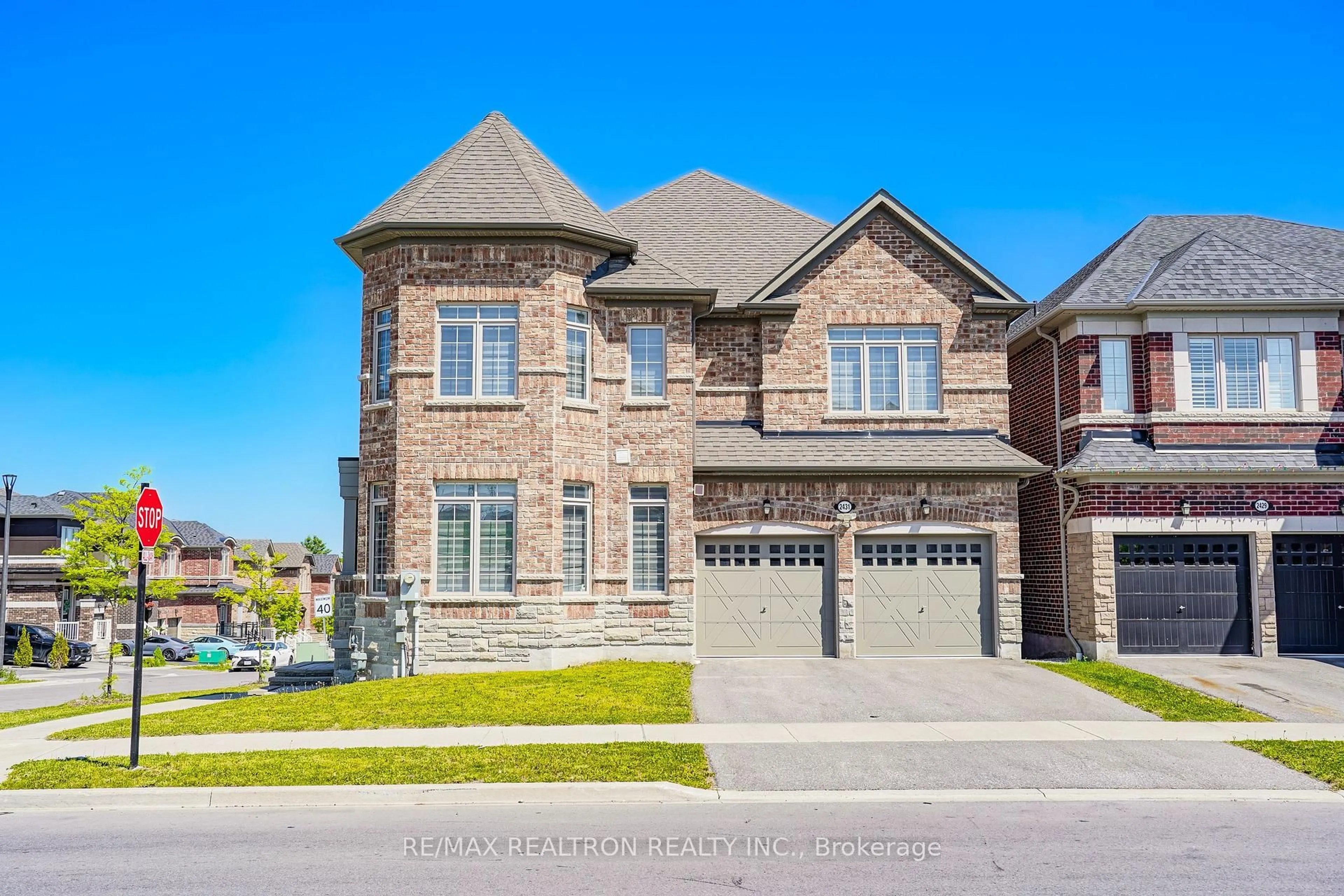Home with brick exterior material, street for 2431 Hibiscus Dr, Pickering Ontario L1X 0H1