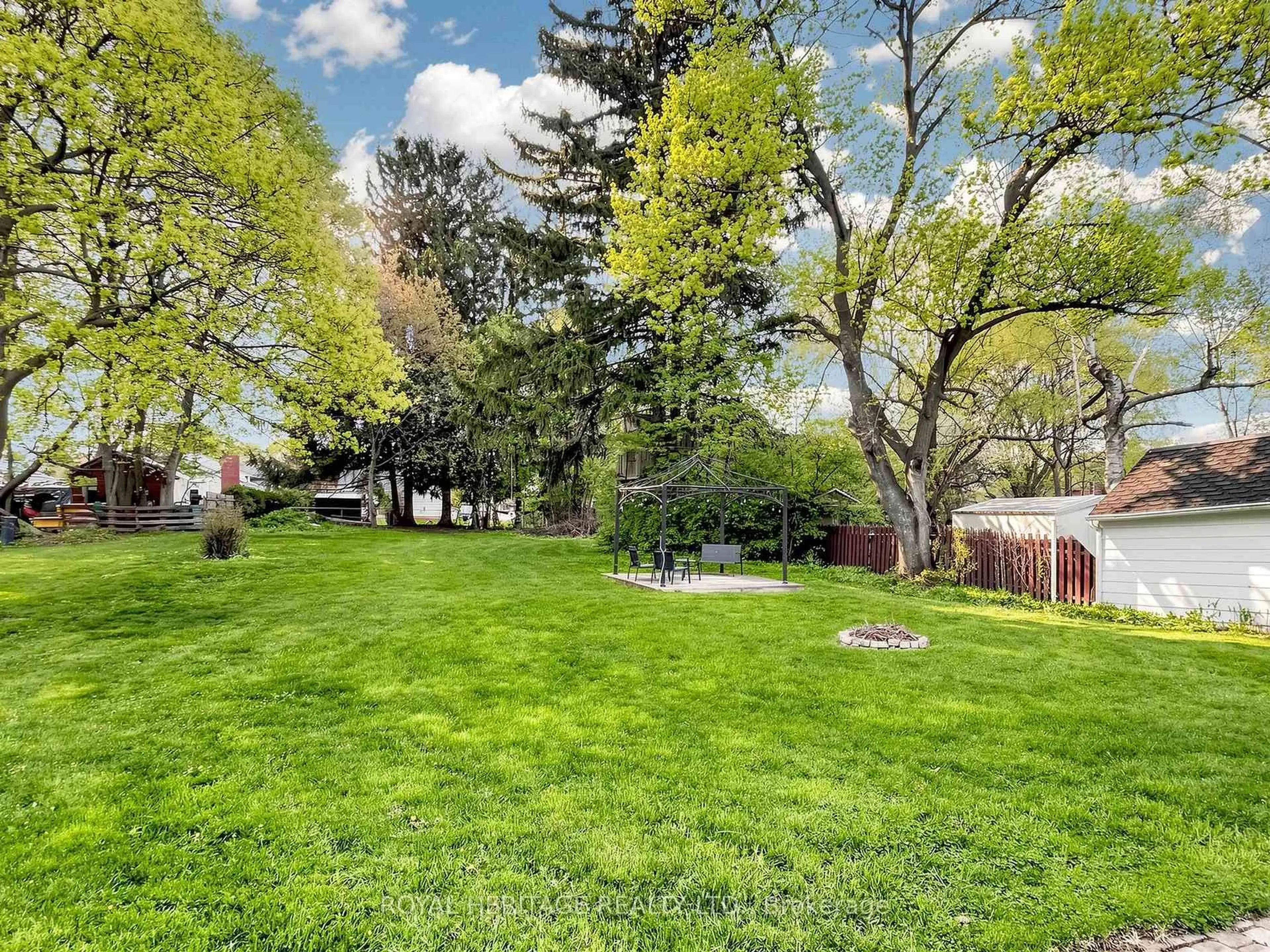 A pic from outside/outdoor area/front of a property/back of a property/a pic from drone, forest/trees view for 97 Scugog St, Clarington Ontario L1C 3J3