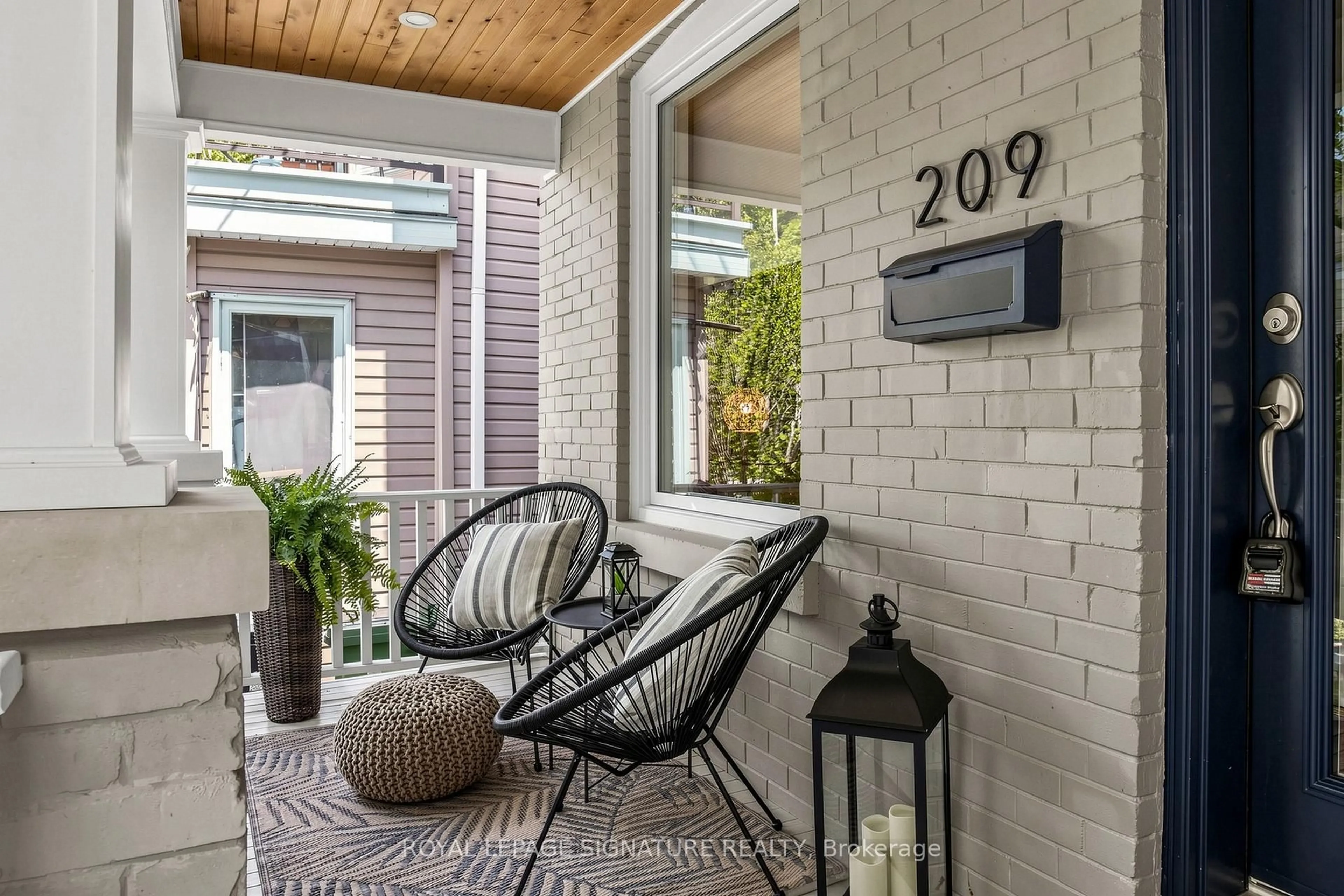 Patio, street for 209 Rhodes Ave, Toronto Ontario M4L 3A2