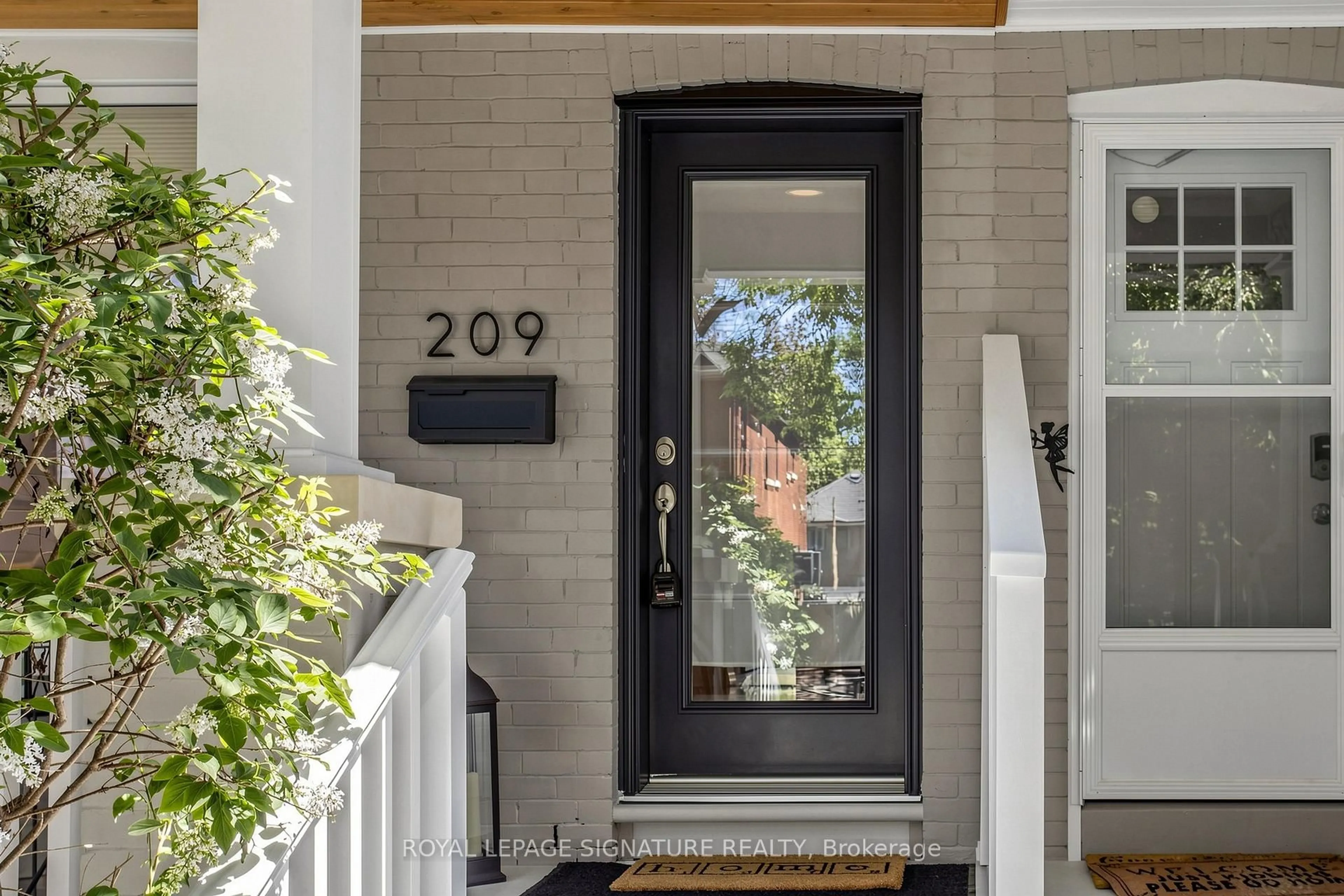 Indoor entryway for 209 Rhodes Ave, Toronto Ontario M4L 3A2