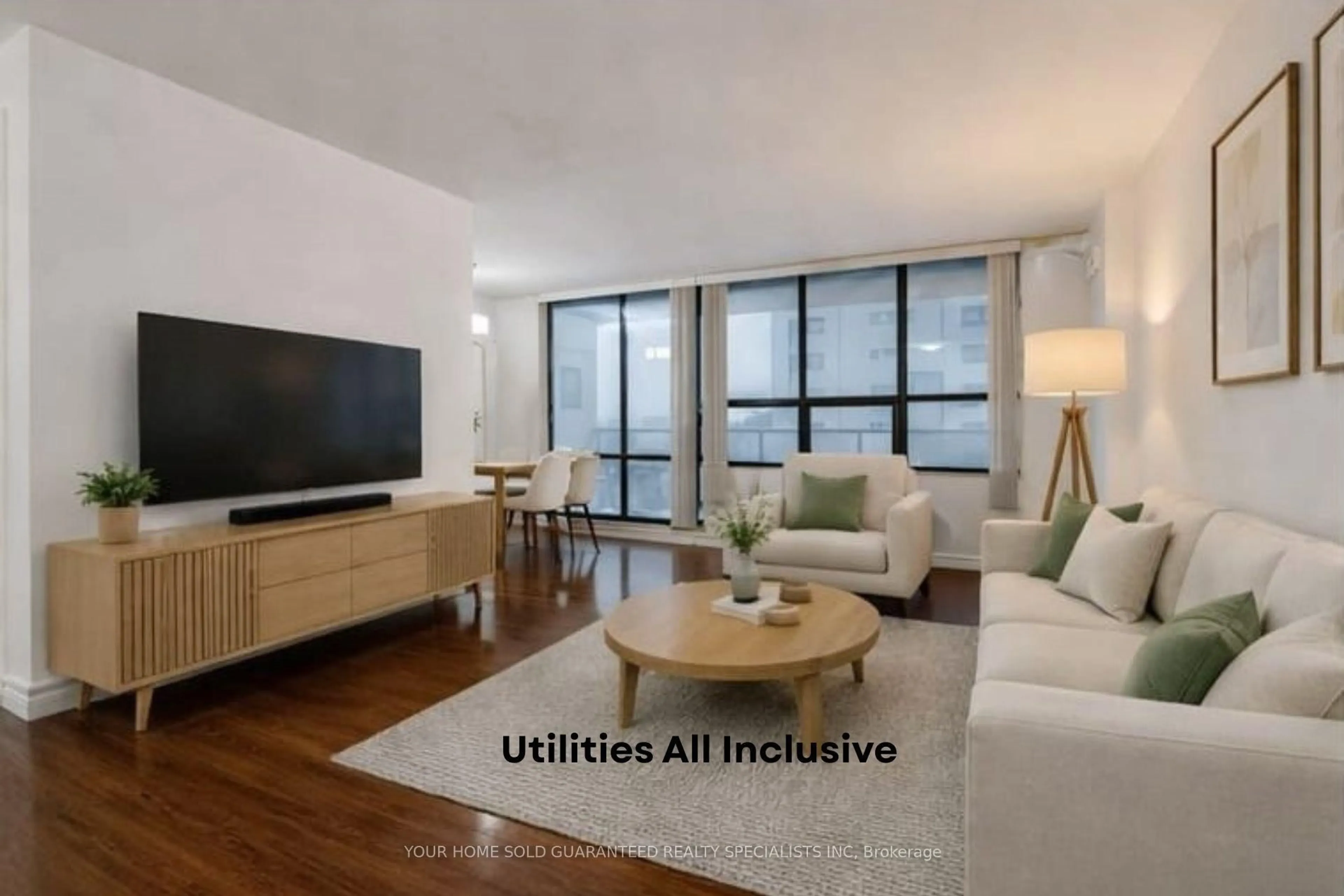Living room with furniture, wood/laminate floor for 2721 Victoria Park Ave #602, Toronto Ontario M1T 3N6