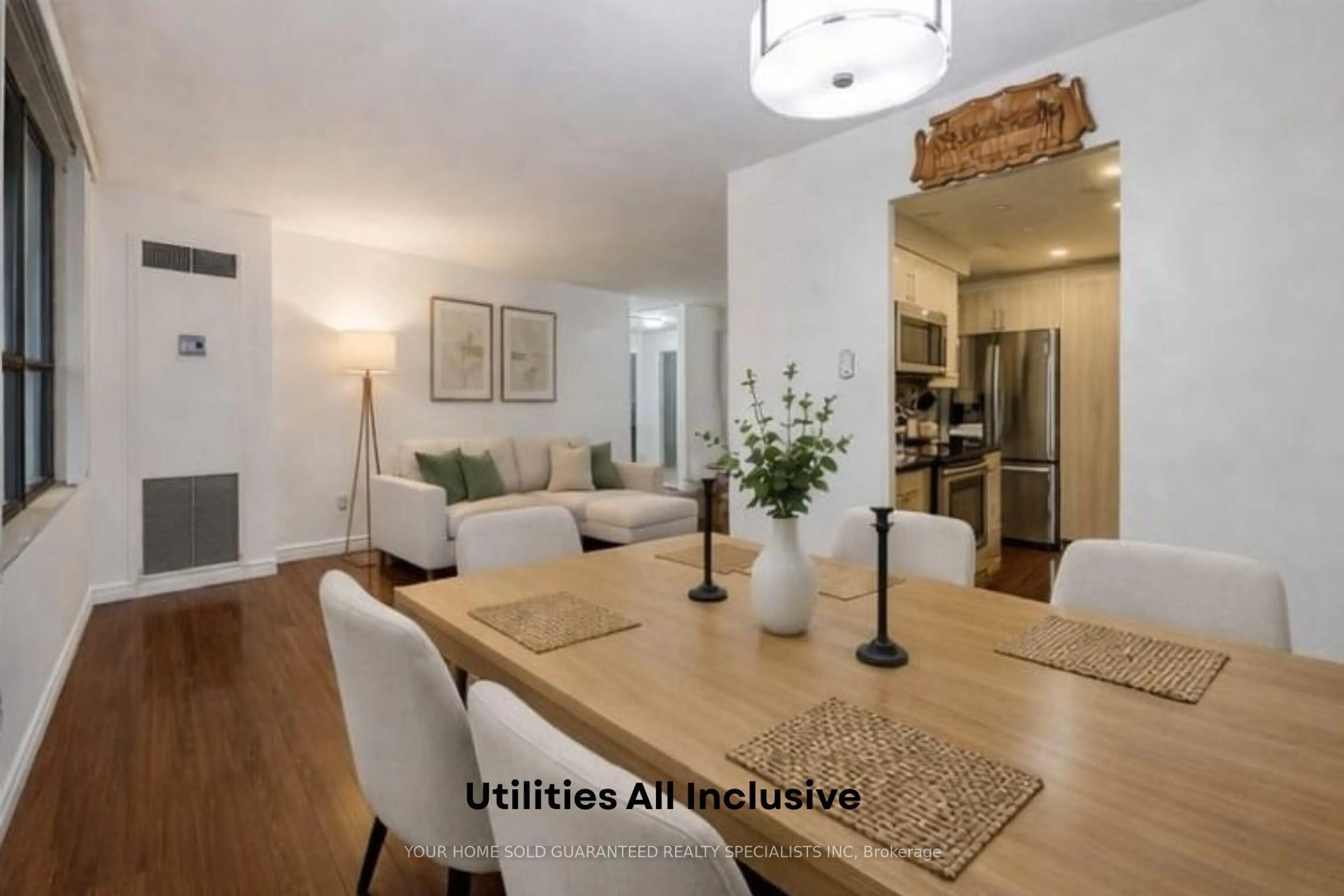 Living room with furniture, wood/laminate floor for 2721 Victoria Park Ave #602, Toronto Ontario M1T 3N6