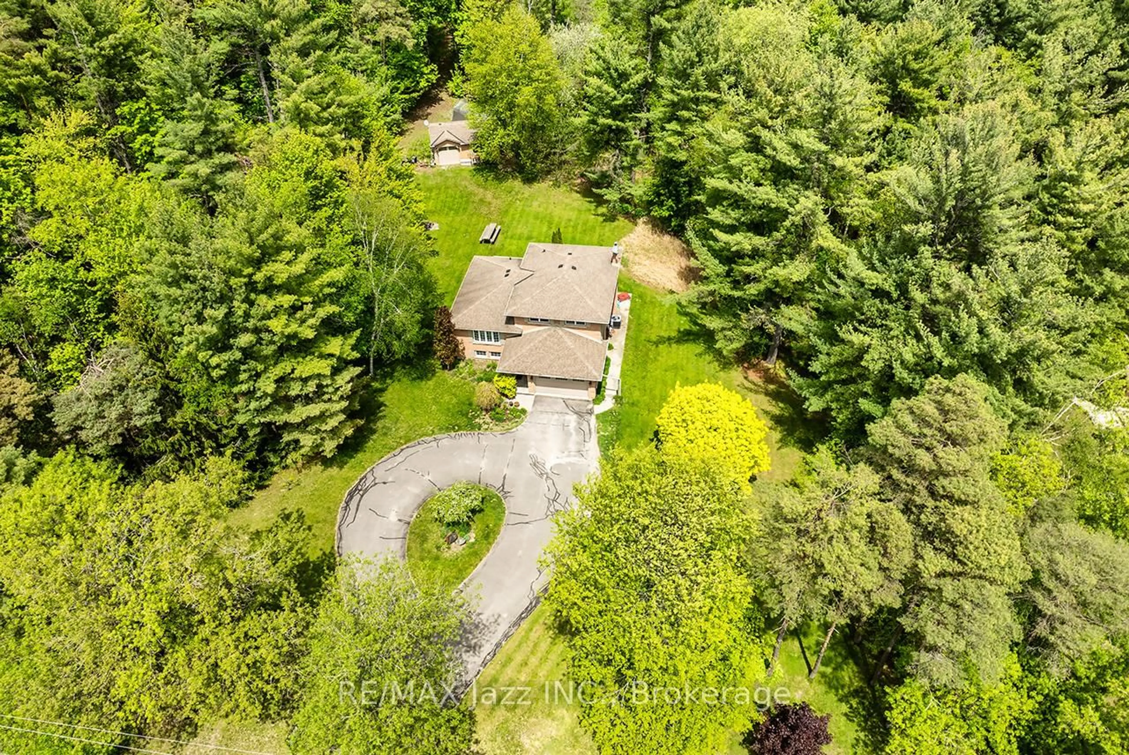 A pic from outside/outdoor area/front of a property/back of a property/a pic from drone, forest/trees view for 10049 Old Scugog Rd, Clarington Ontario L0B 1B0