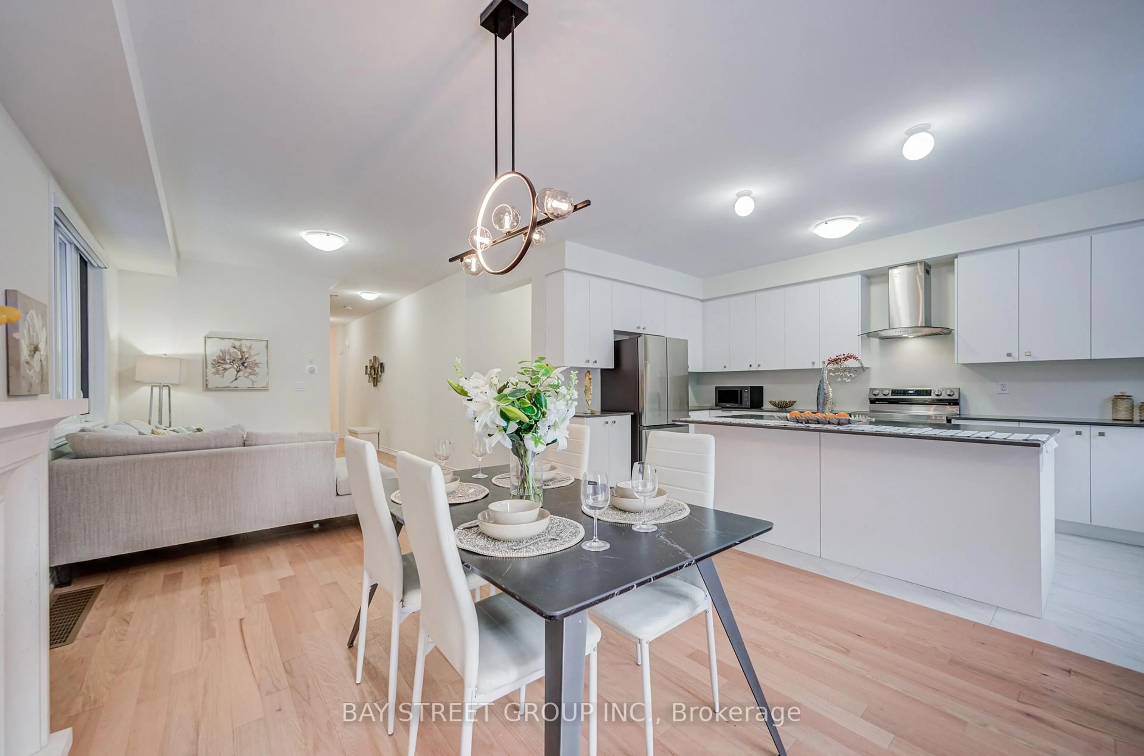 Open concept kitchen, wood/laminate floor for 2916 Nakina St, Pickering Ontario L1X 2R5