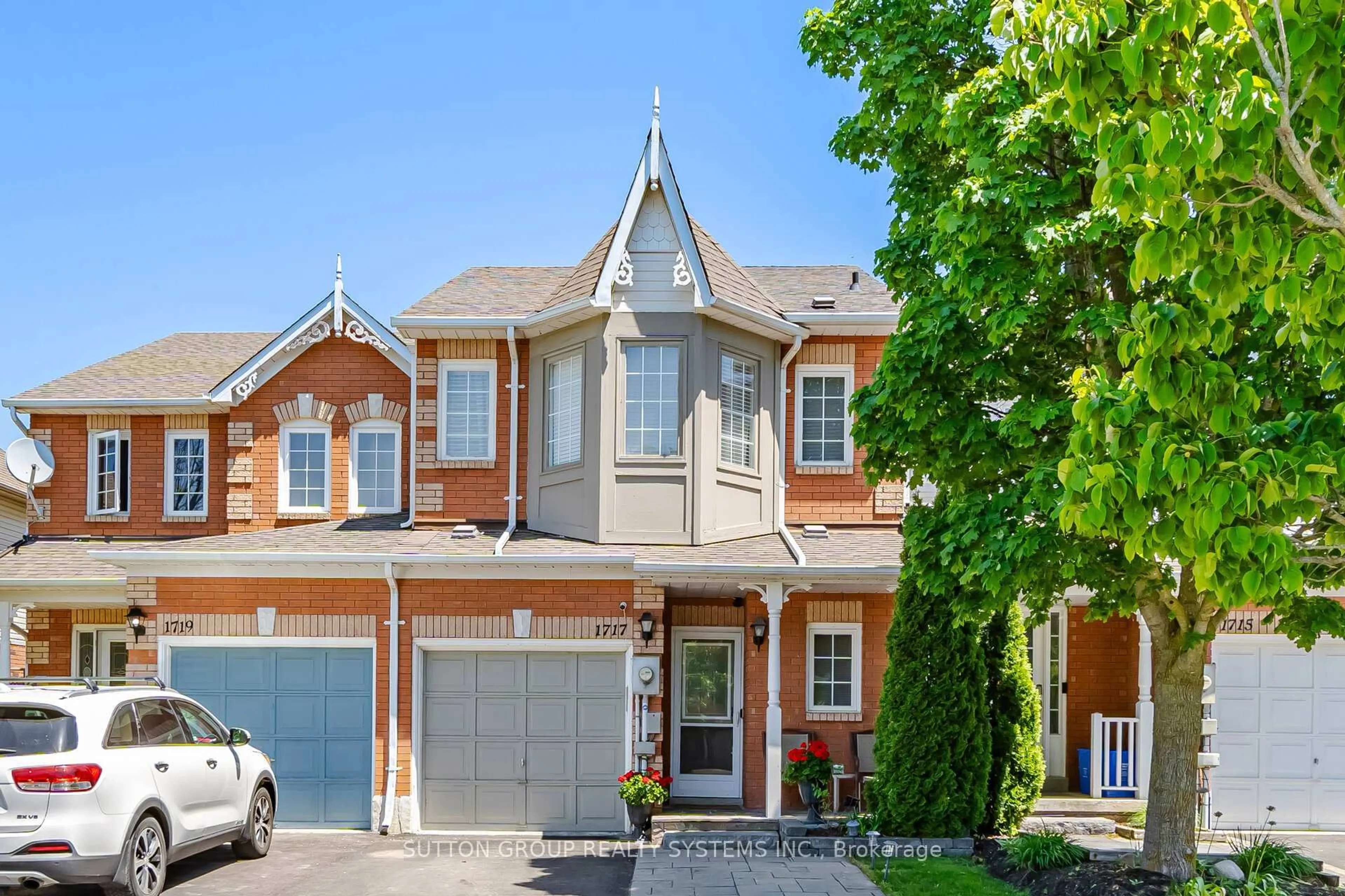 Home with brick exterior material, street for 1717 Woodgate Tr, Oshawa Ontario L1G 8B4