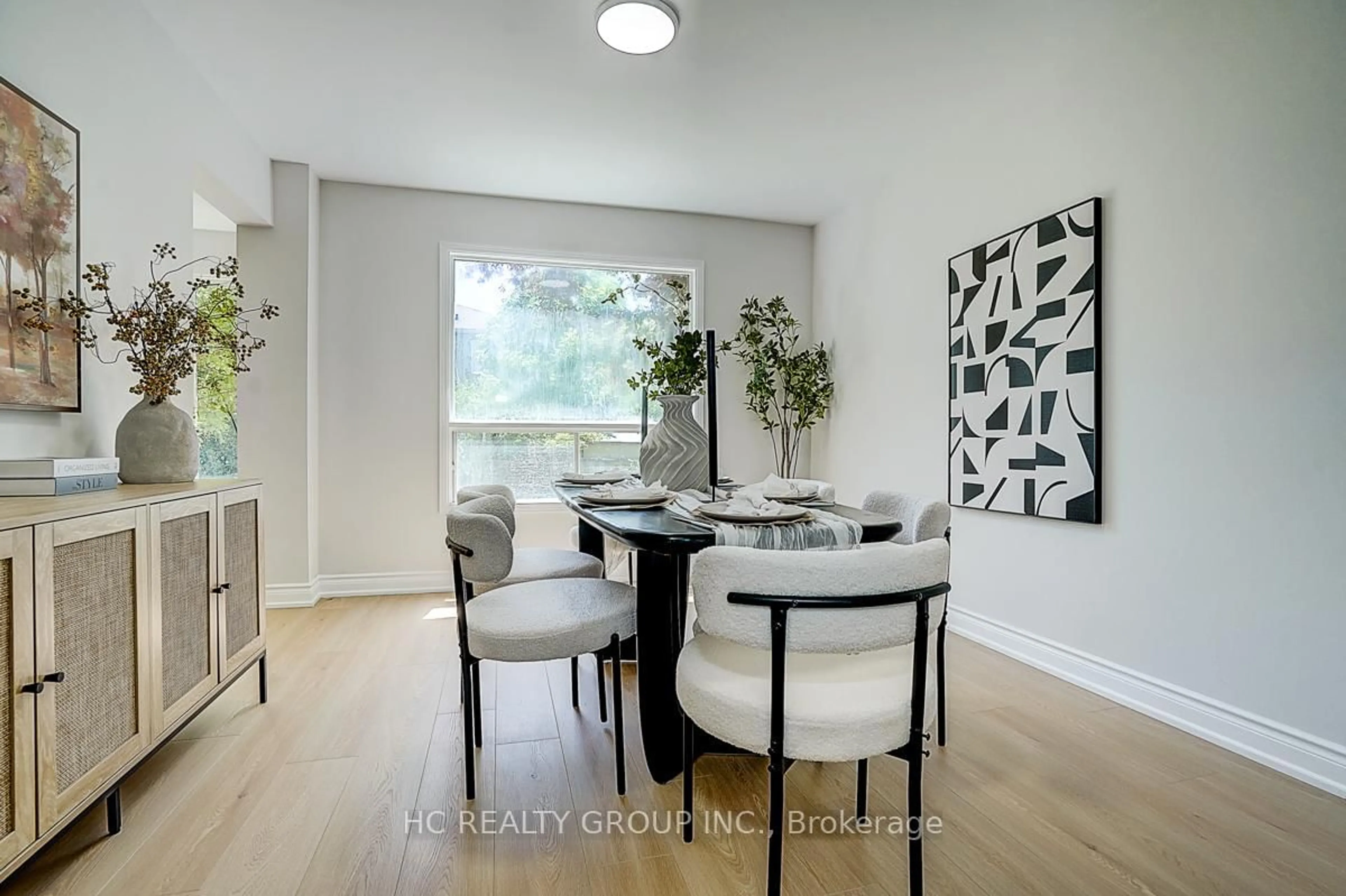 Dining room, wood/laminate floor for 55 Grantown Ave, Toronto Ontario M1C 3R8
