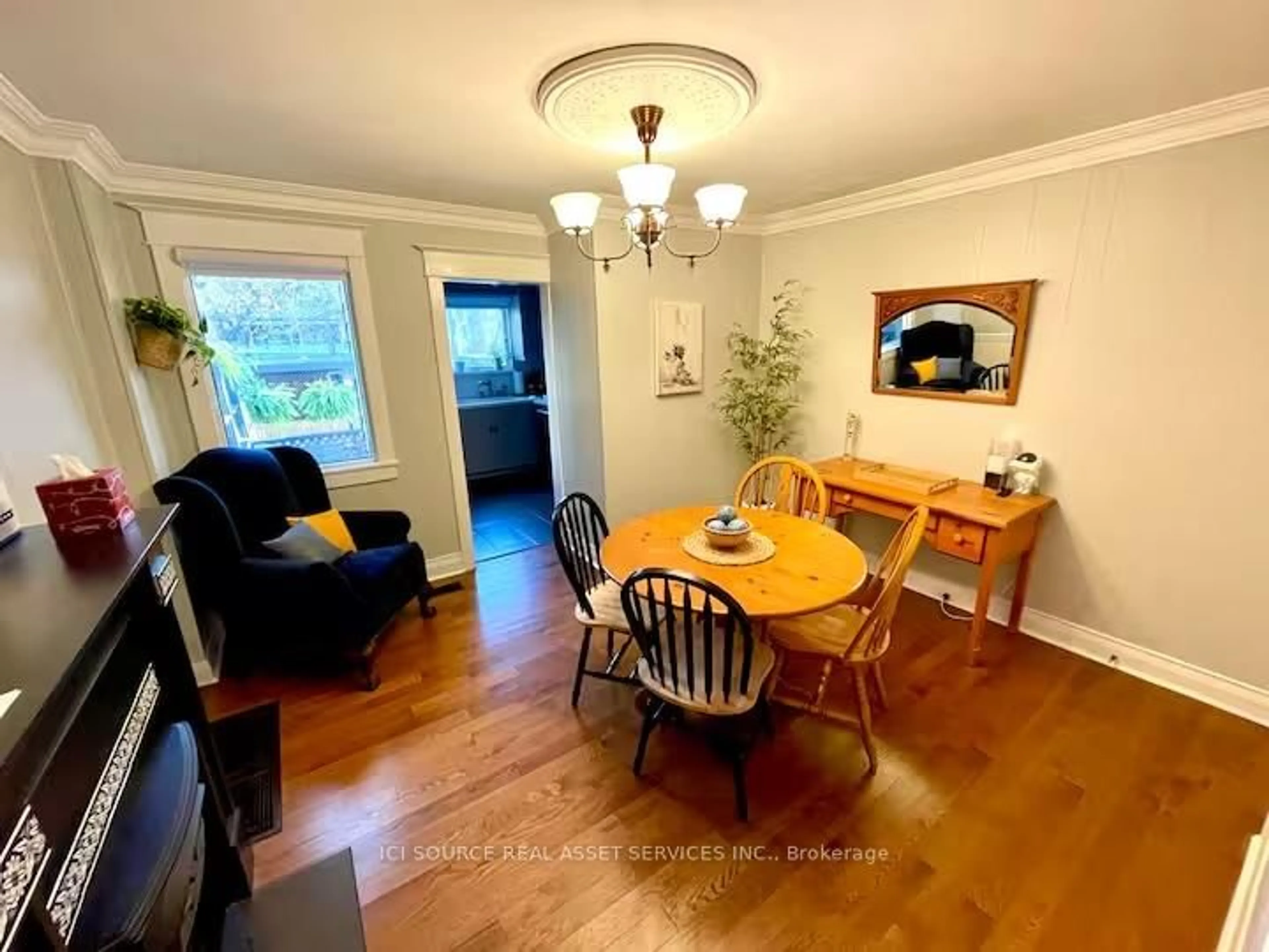 Dining room, wood/laminate floor for 91 Alton Ave, Toronto Ontario M4L 2M3