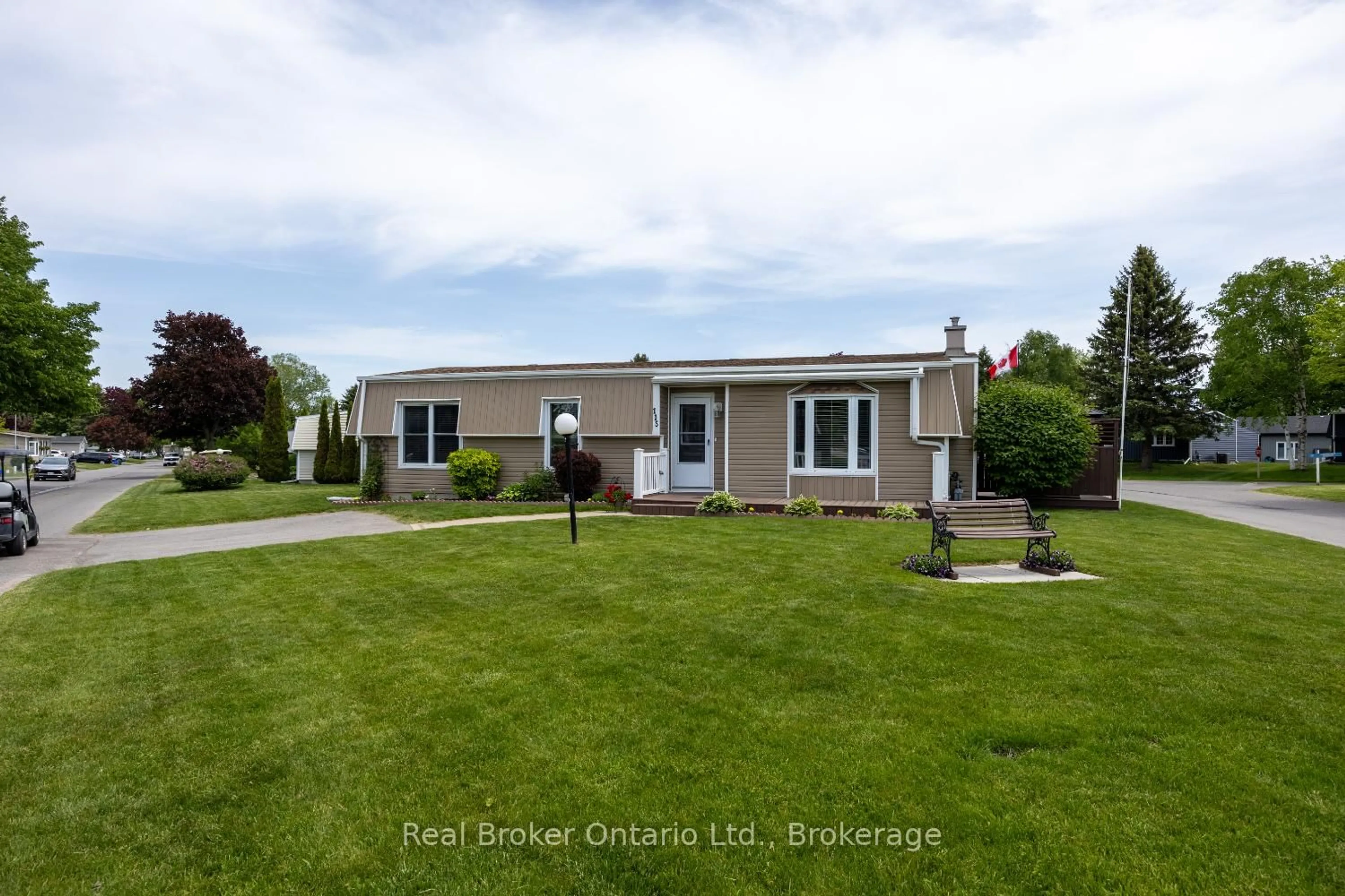 Home with vinyl exterior material, street for 115 Wilmot Tr, Clarington Ontario L1B 1A8