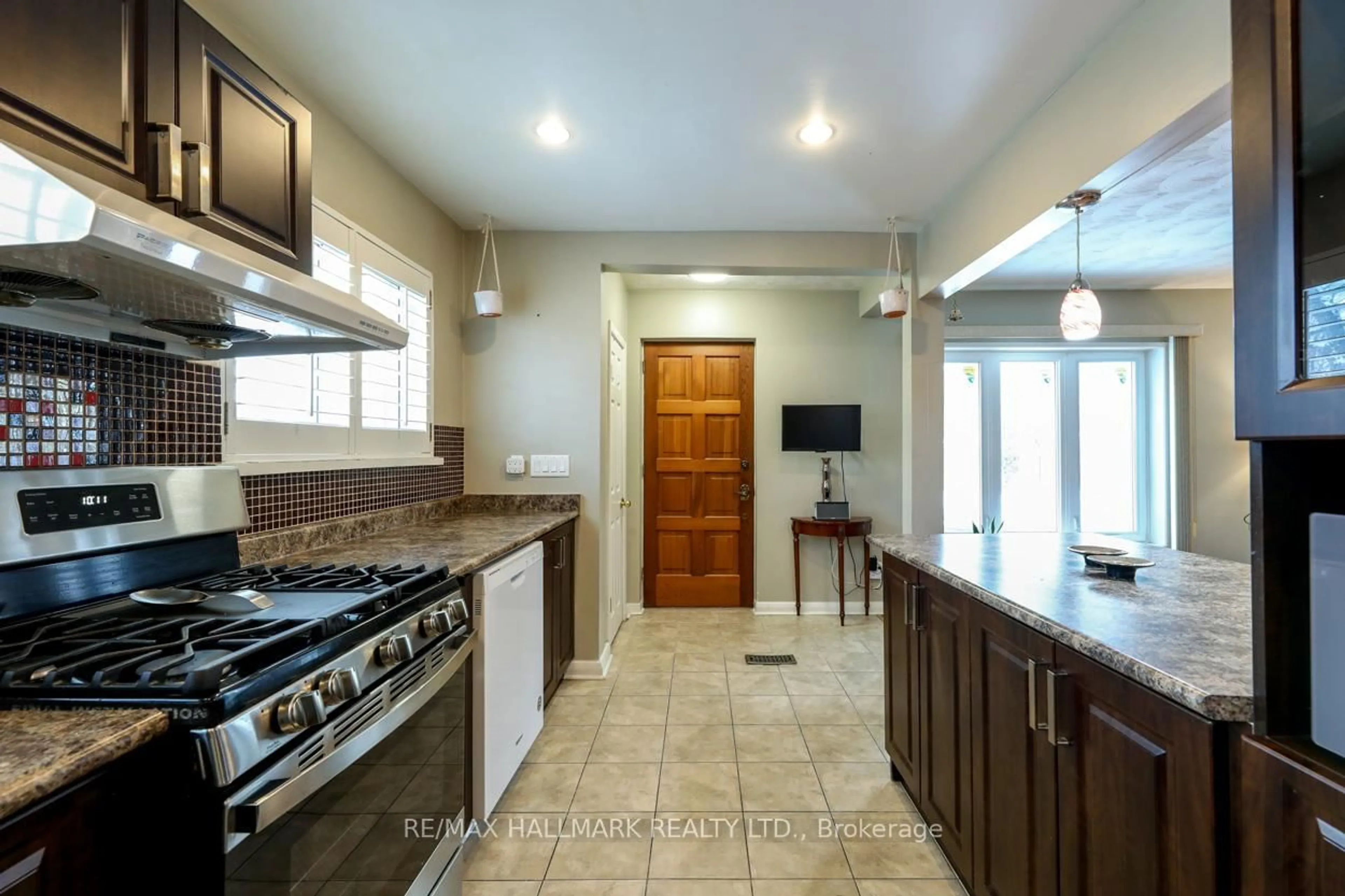 Open concept kitchen, ceramic/tile floor for 12 Trinnell Blvd, Toronto Ontario M1L 1S5
