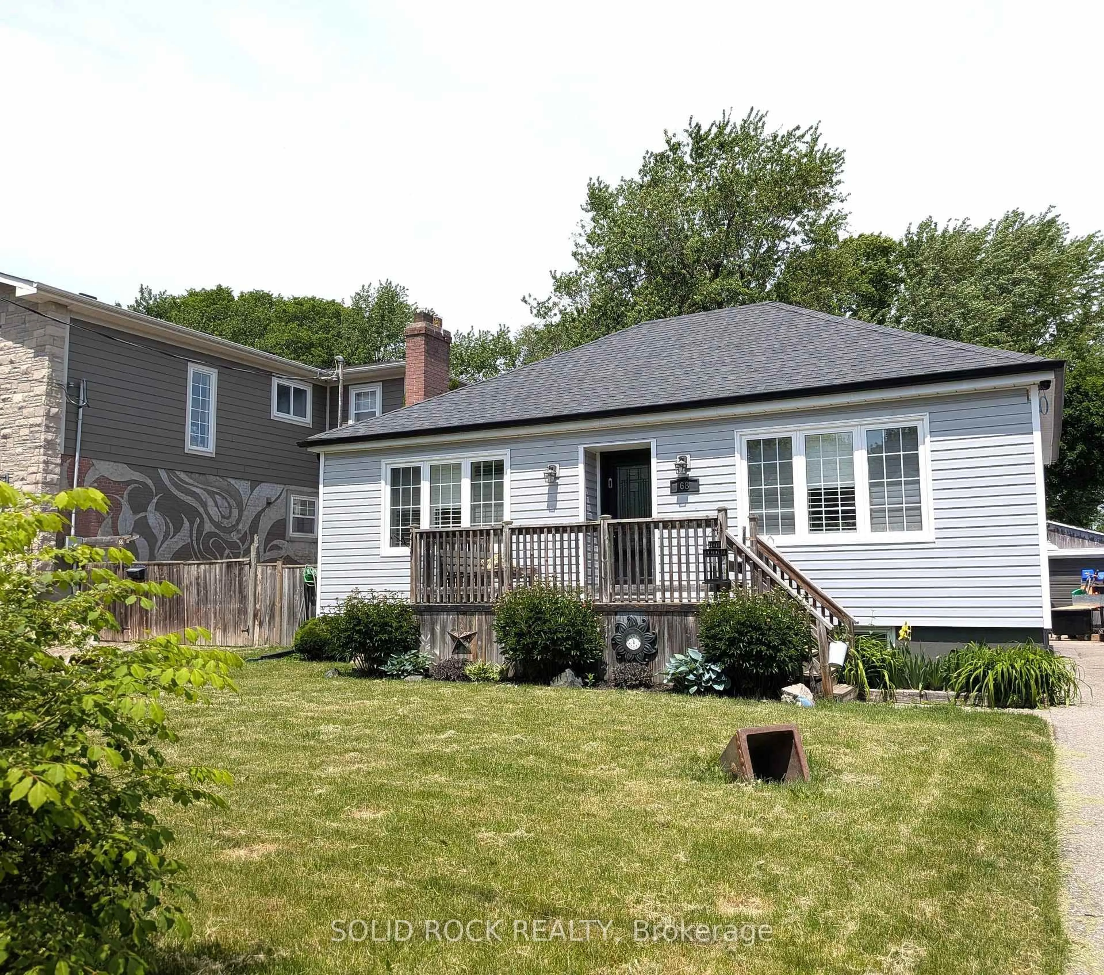 Home with vinyl exterior material, street for 68 Cree Ave, Toronto Ontario M1M 1Z6