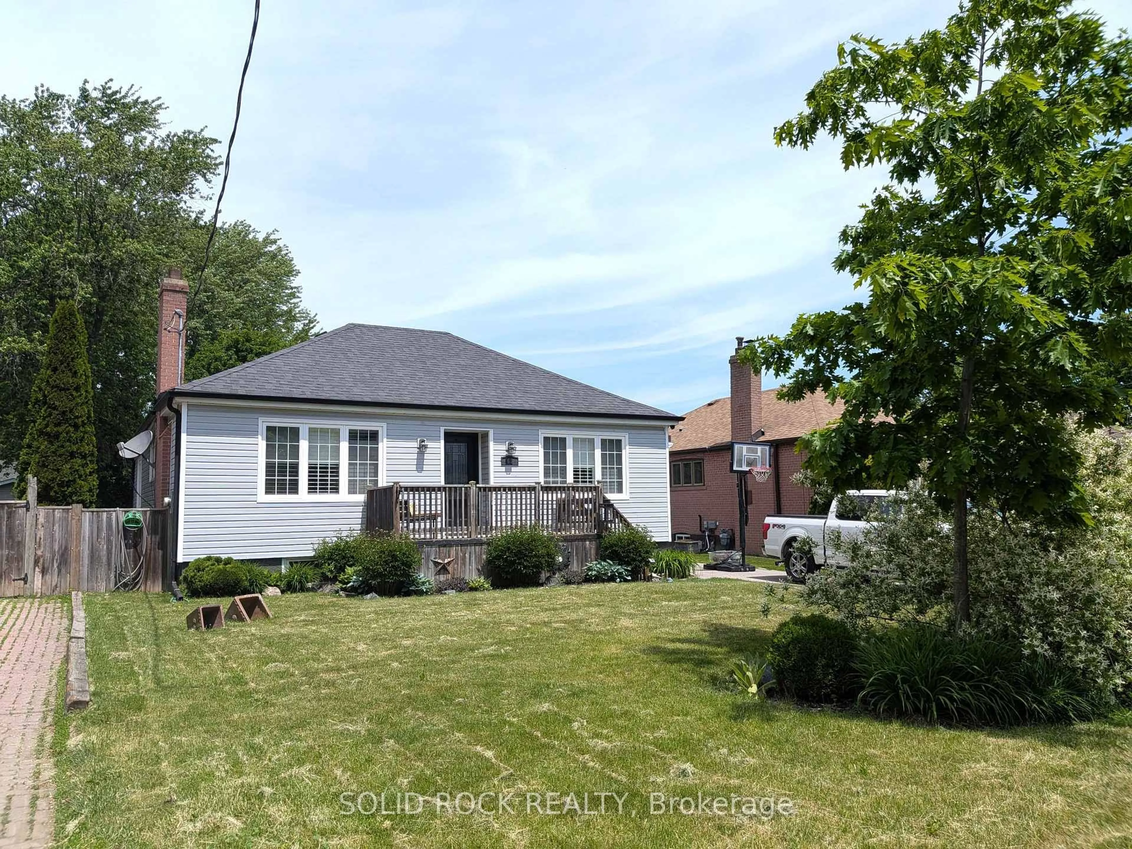 A pic from outside/outdoor area/front of a property/back of a property/a pic from drone, street for 68 Cree Ave, Toronto Ontario M1M 1Z6
