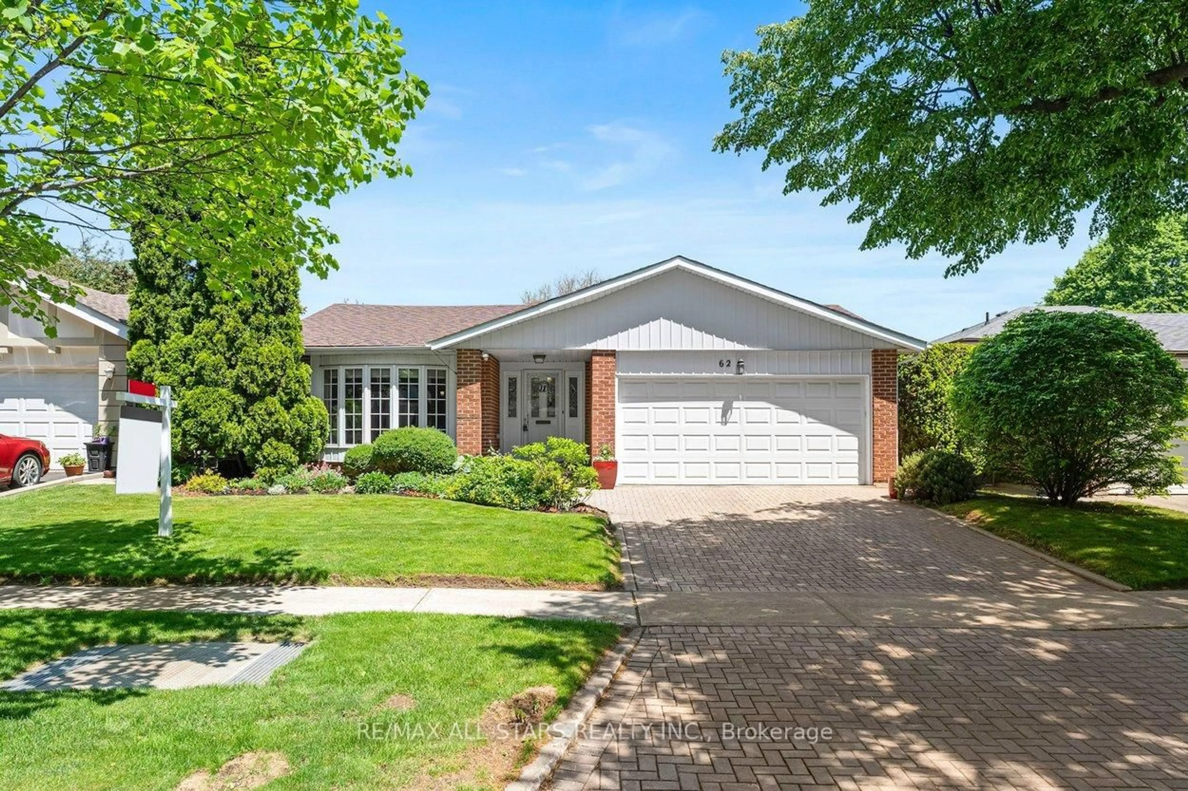 Home with brick exterior material, street for 62 Deerbrook Tr, Toronto Ontario M1W 1V4