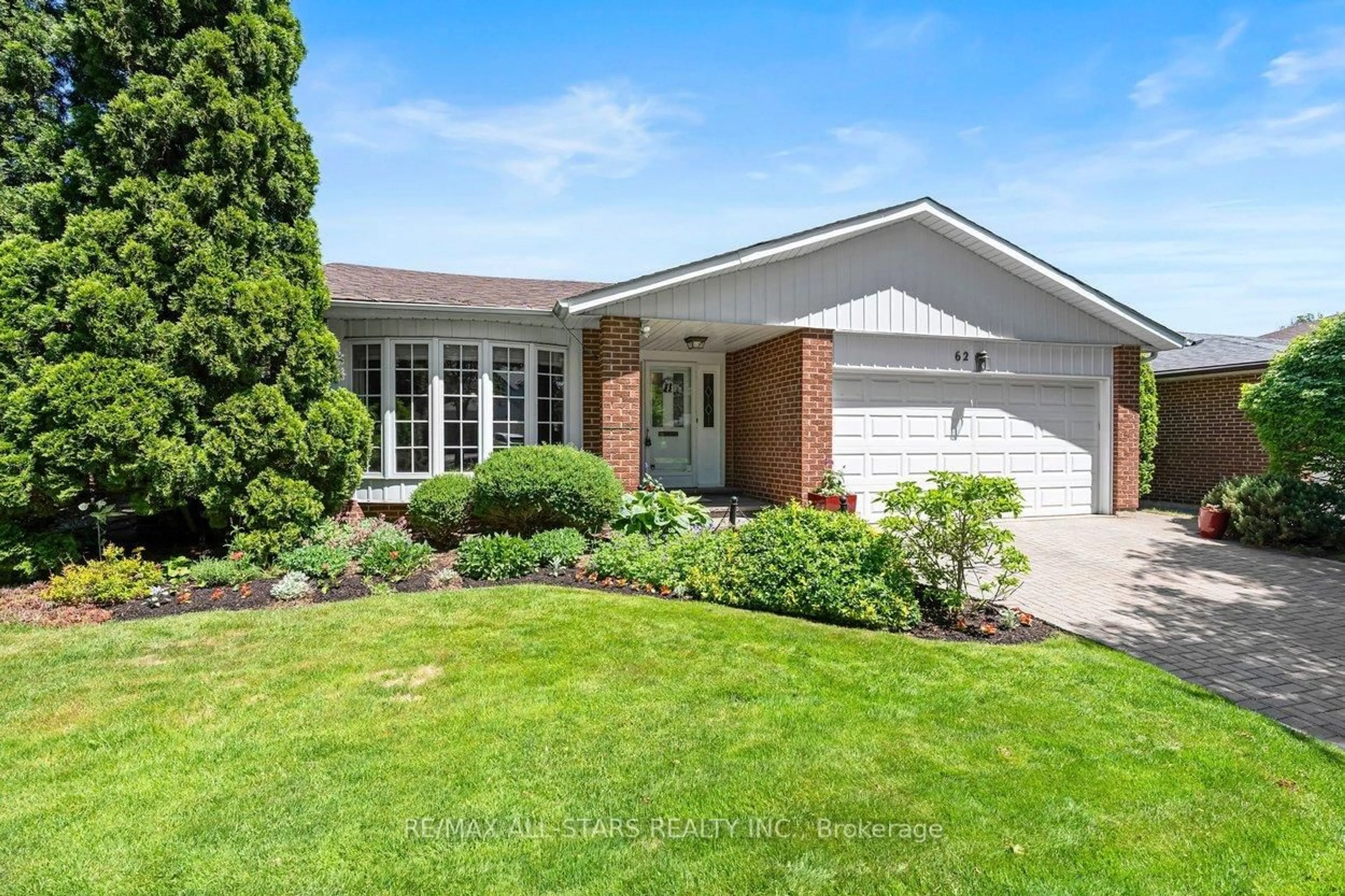 Home with vinyl exterior material, street for 62 Deerbrook Tr, Toronto Ontario M1W 1V4