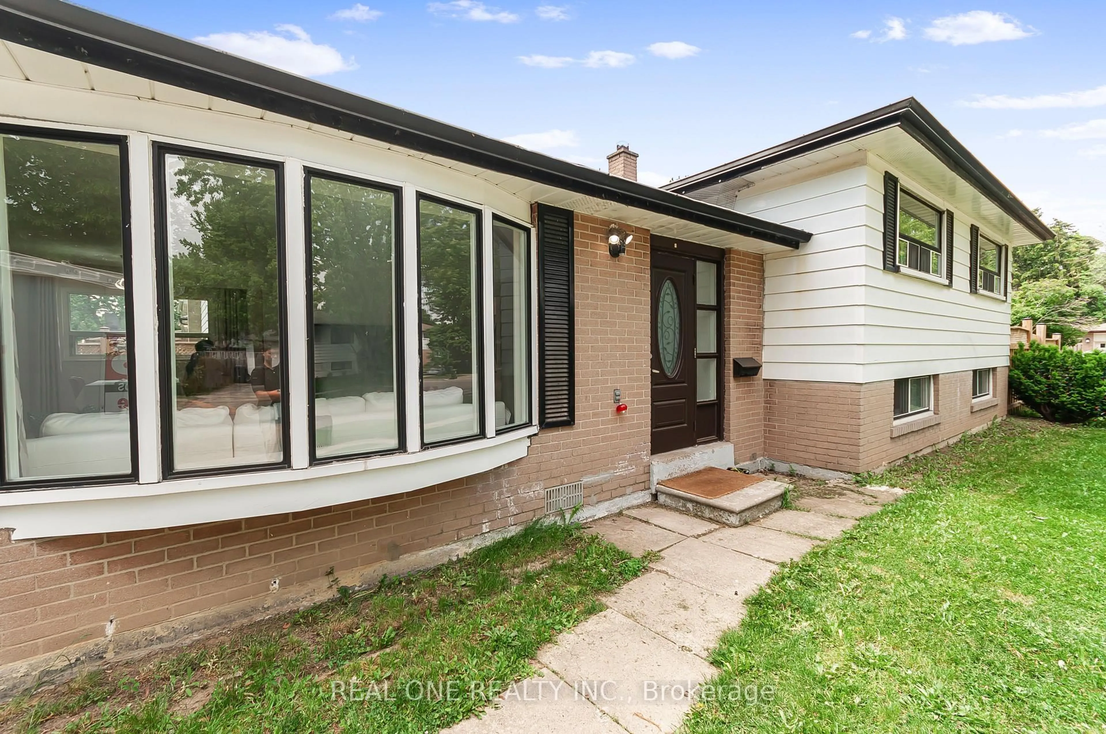 Home with brick exterior material, street for 1 Grovenest Dr, Toronto Ontario M1E 4J2