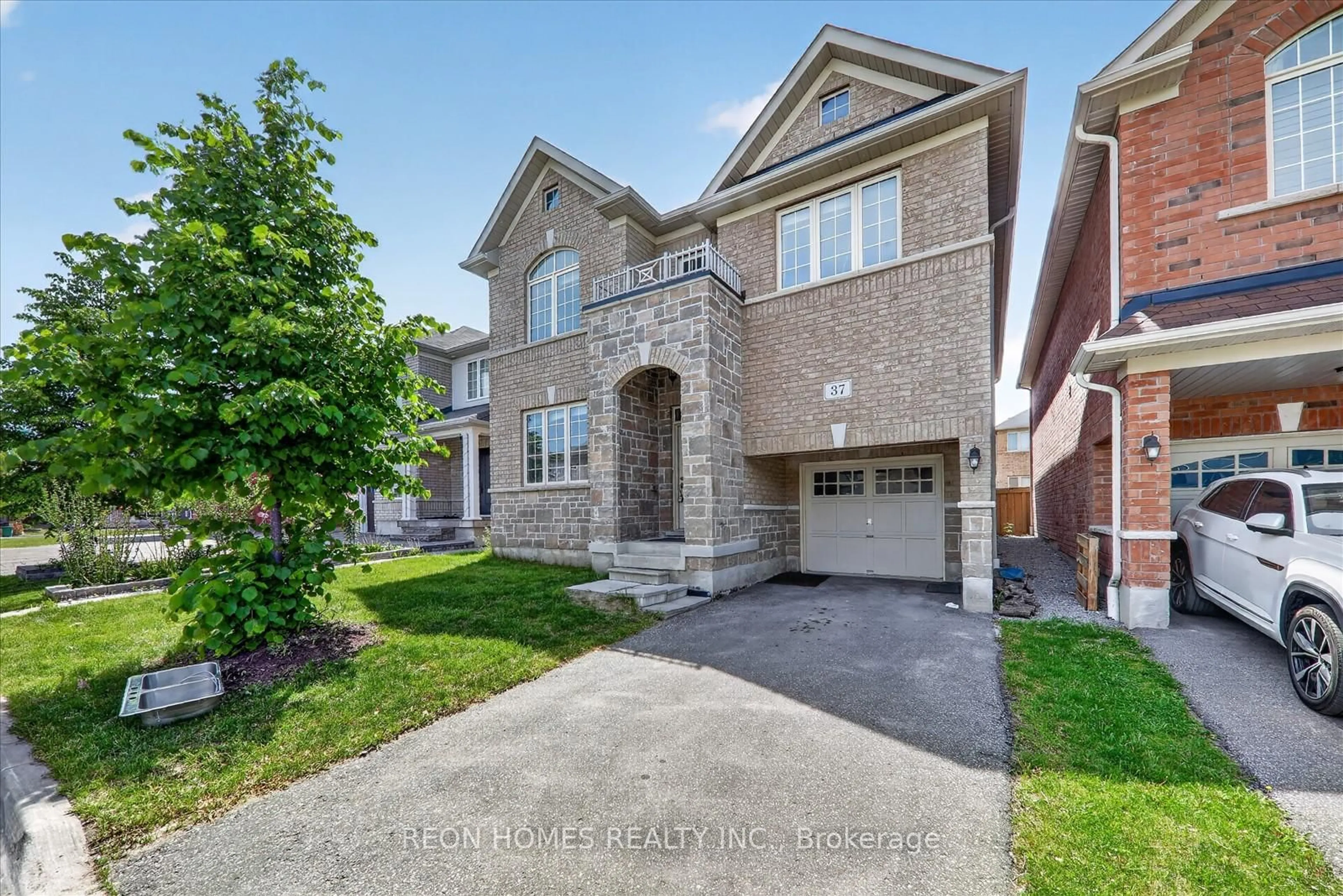Home with brick exterior material, street for 37 Raithby Cres, Ajax Ontario L1Z 0S6