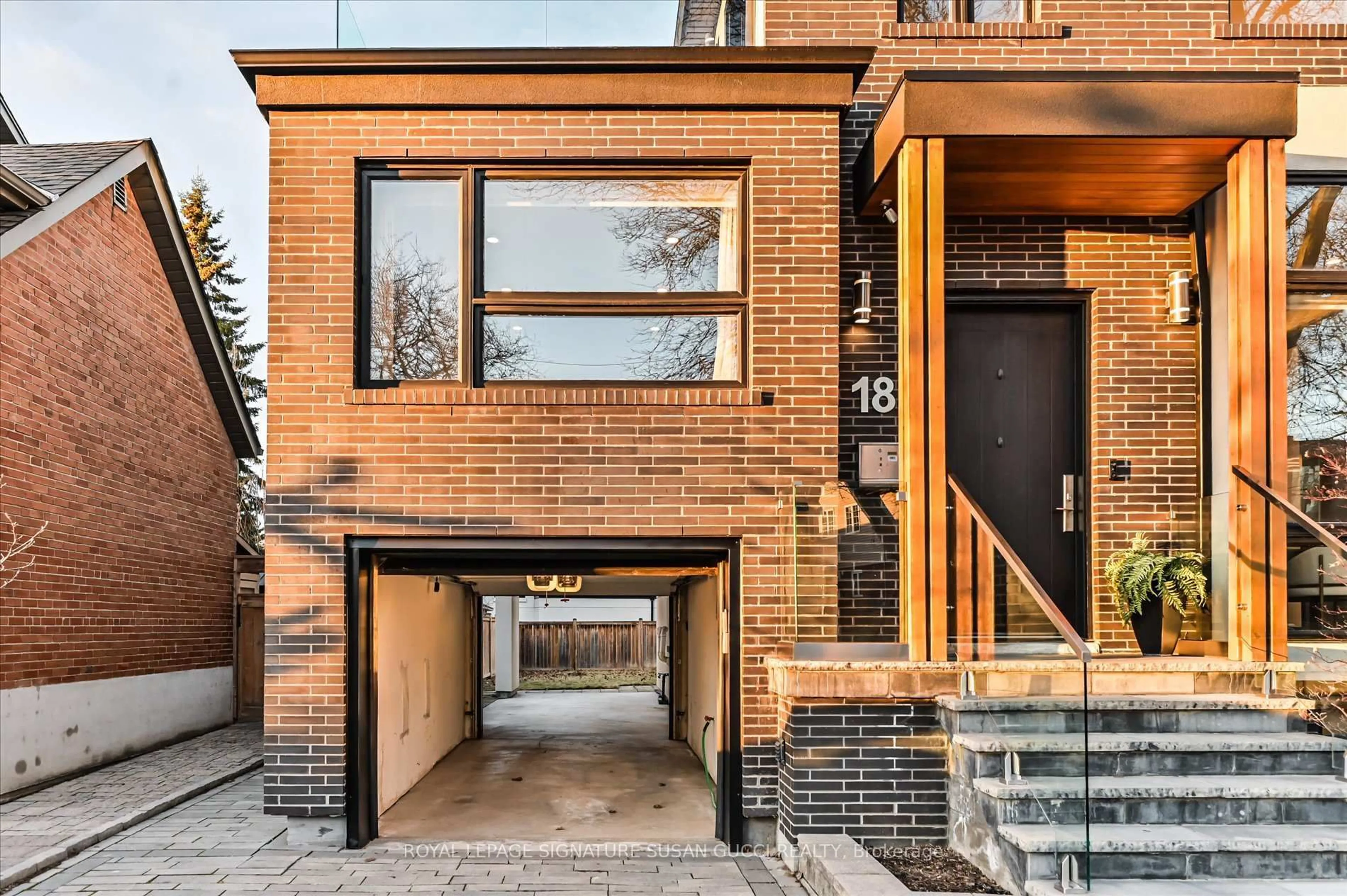 Home with brick exterior material, street for 18 Ferris Rd, Toronto Ontario M4B 1G1