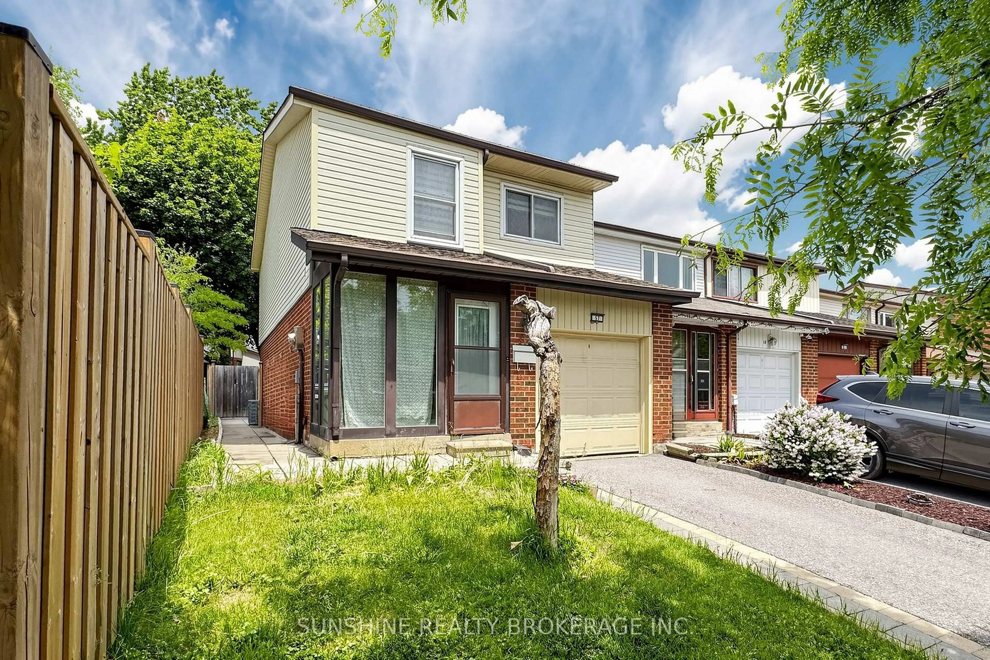 Home with brick exterior material, street for 57 Springhouse Sq, Toronto Ontario M1W 2X2