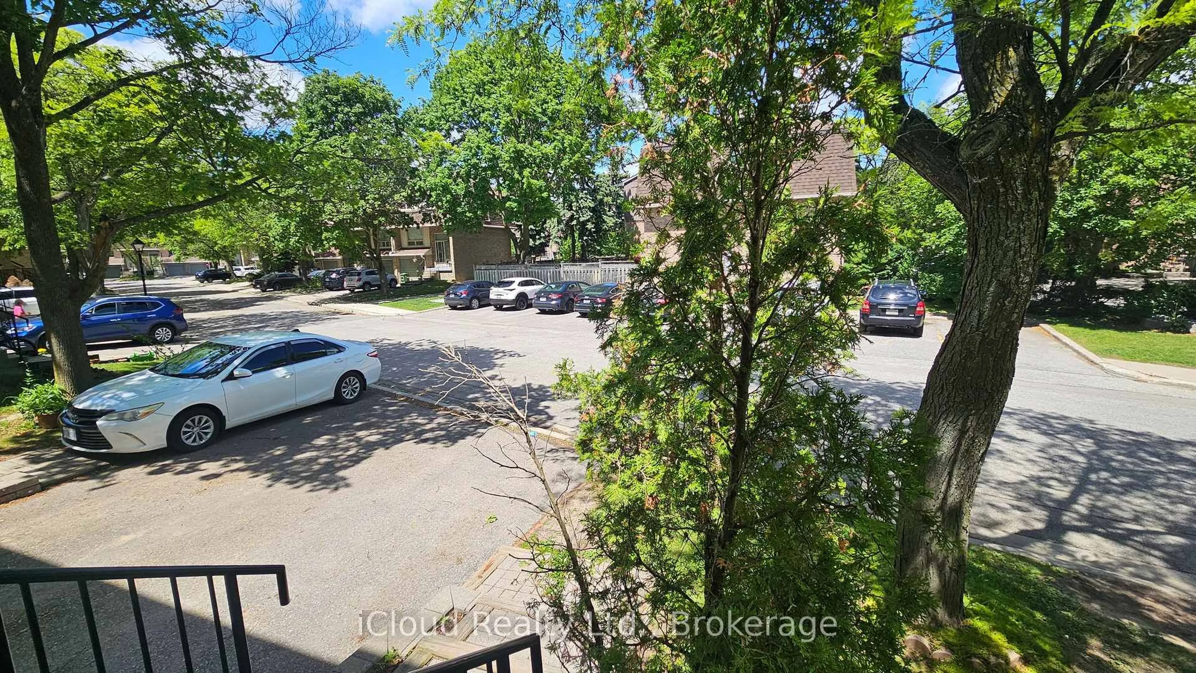 A pic from outside/outdoor area/front of a property/back of a property/a pic from drone, street for 371 Orton Park Rd #120, Toronto Ontario M1G 3V1