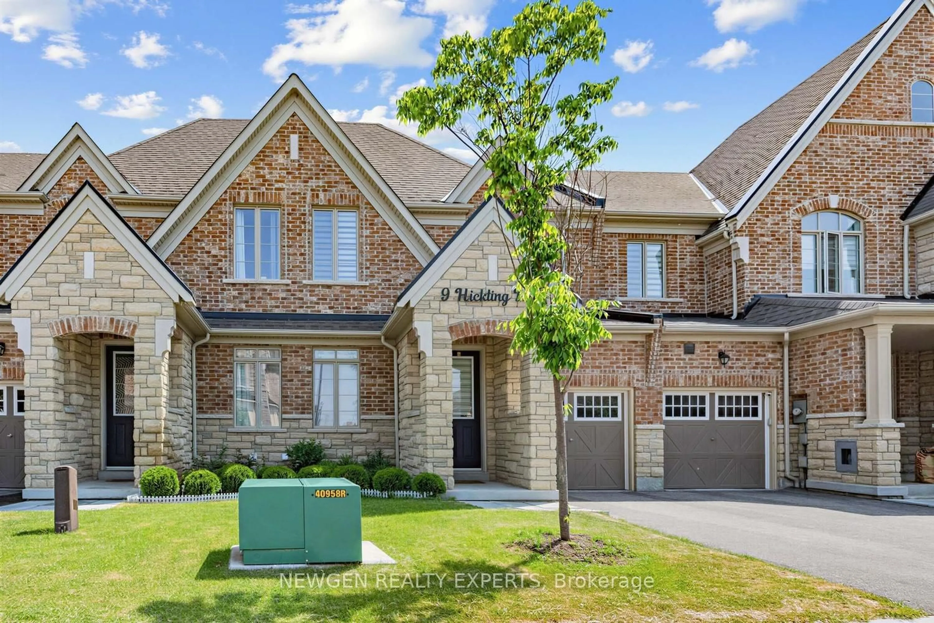 Home with brick exterior material, street for 9 Hickling Lane, Ajax Ontario L1T 4R1