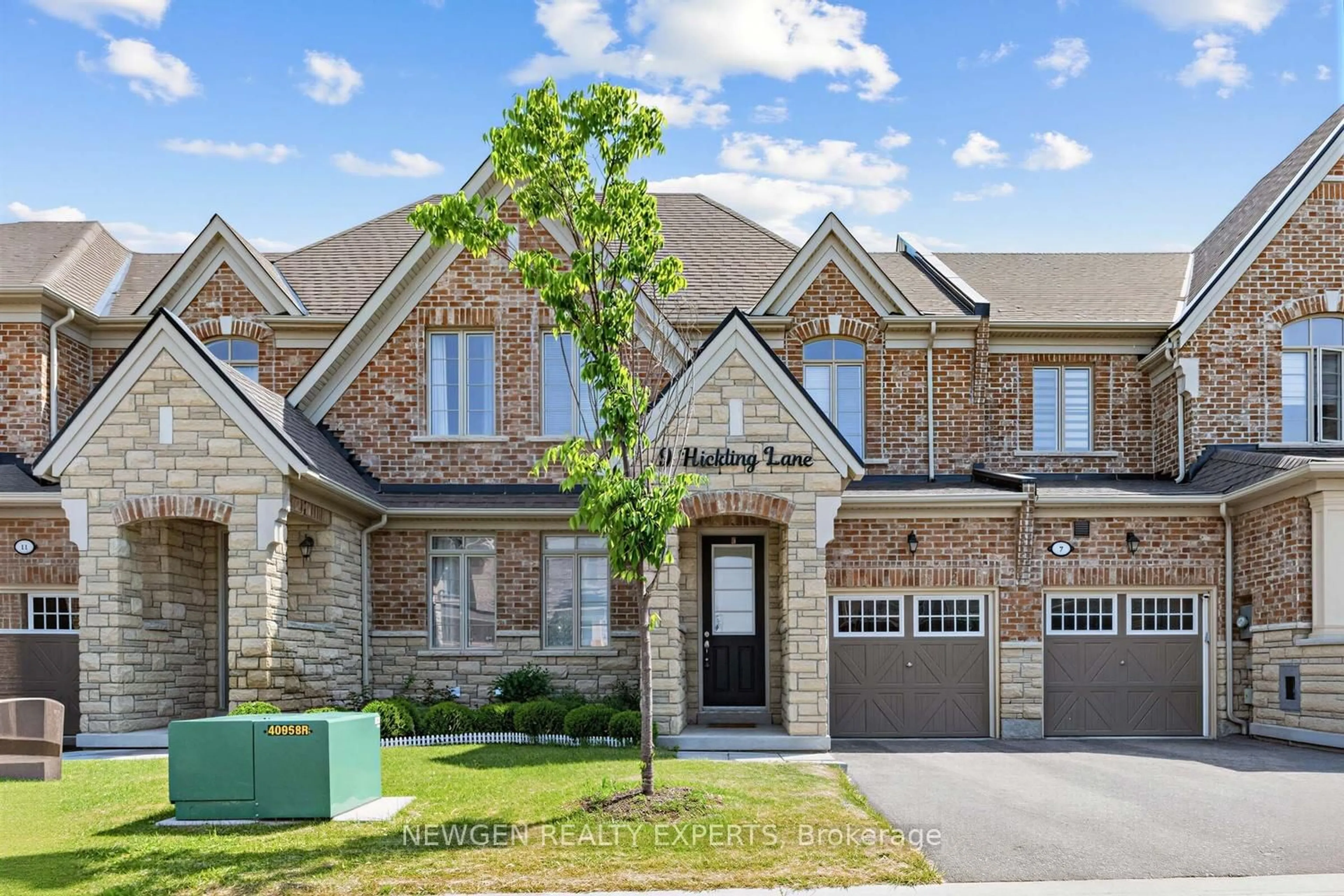 Home with brick exterior material, street for 9 Hickling Lane, Ajax Ontario L1T 4R1