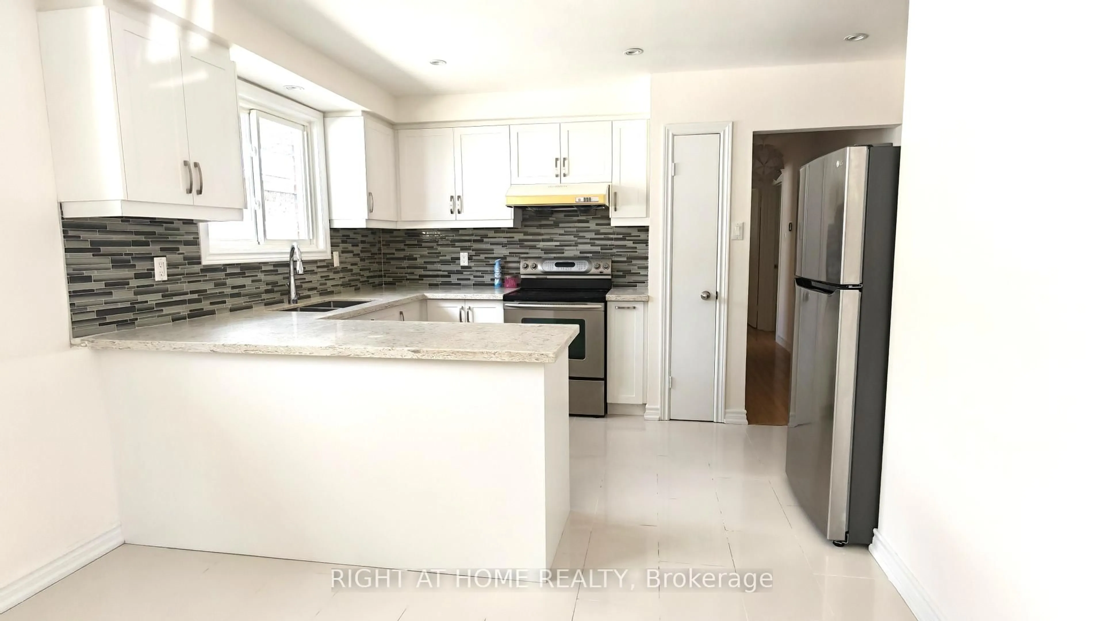 Open concept kitchen, ceramic/tile floor for 81 Heaslip Terr, Toronto Ontario M1T 1W8