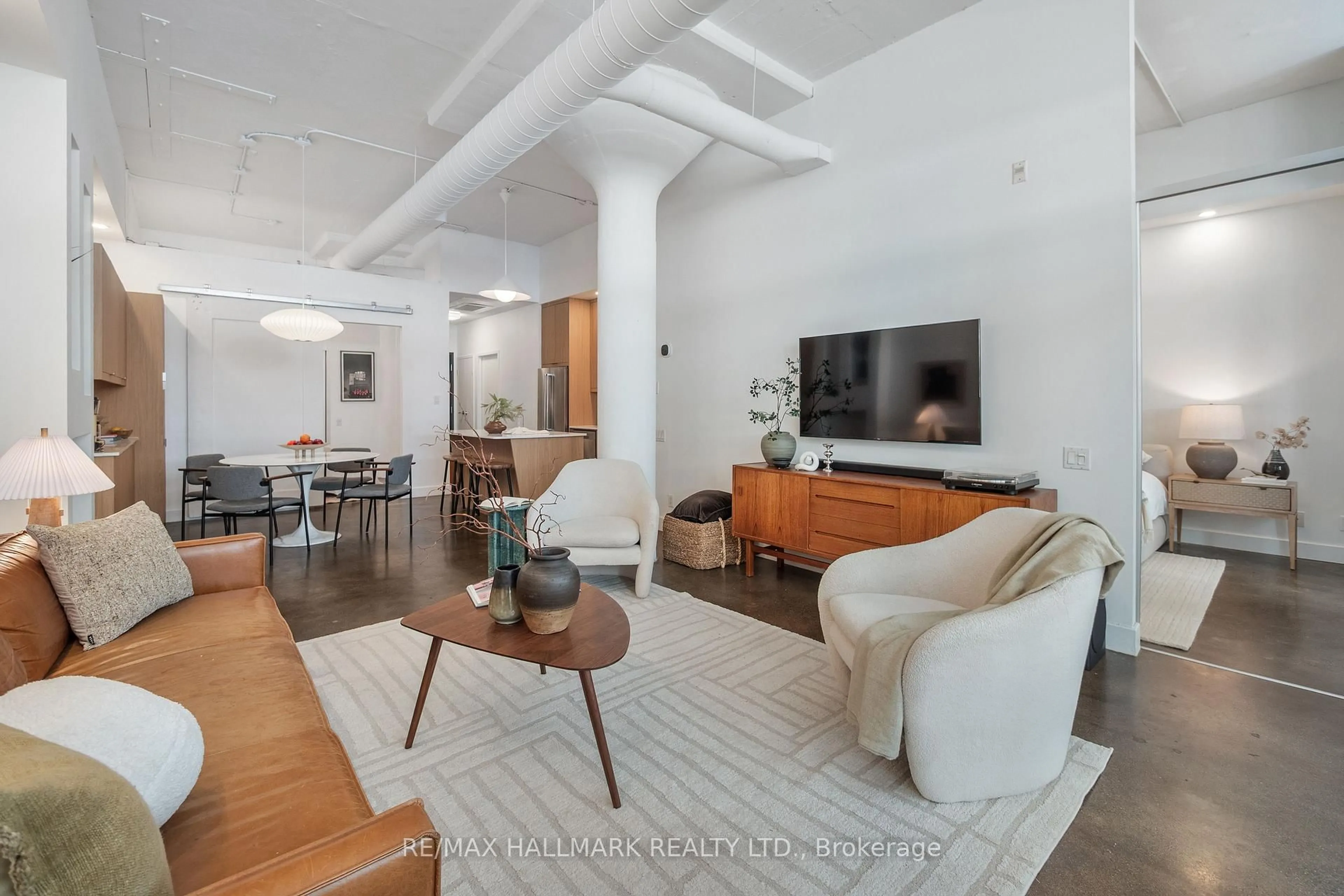 Living room with furniture, unknown for 233 Carlaw Ave #406, Toronto Ontario M4M 3N6