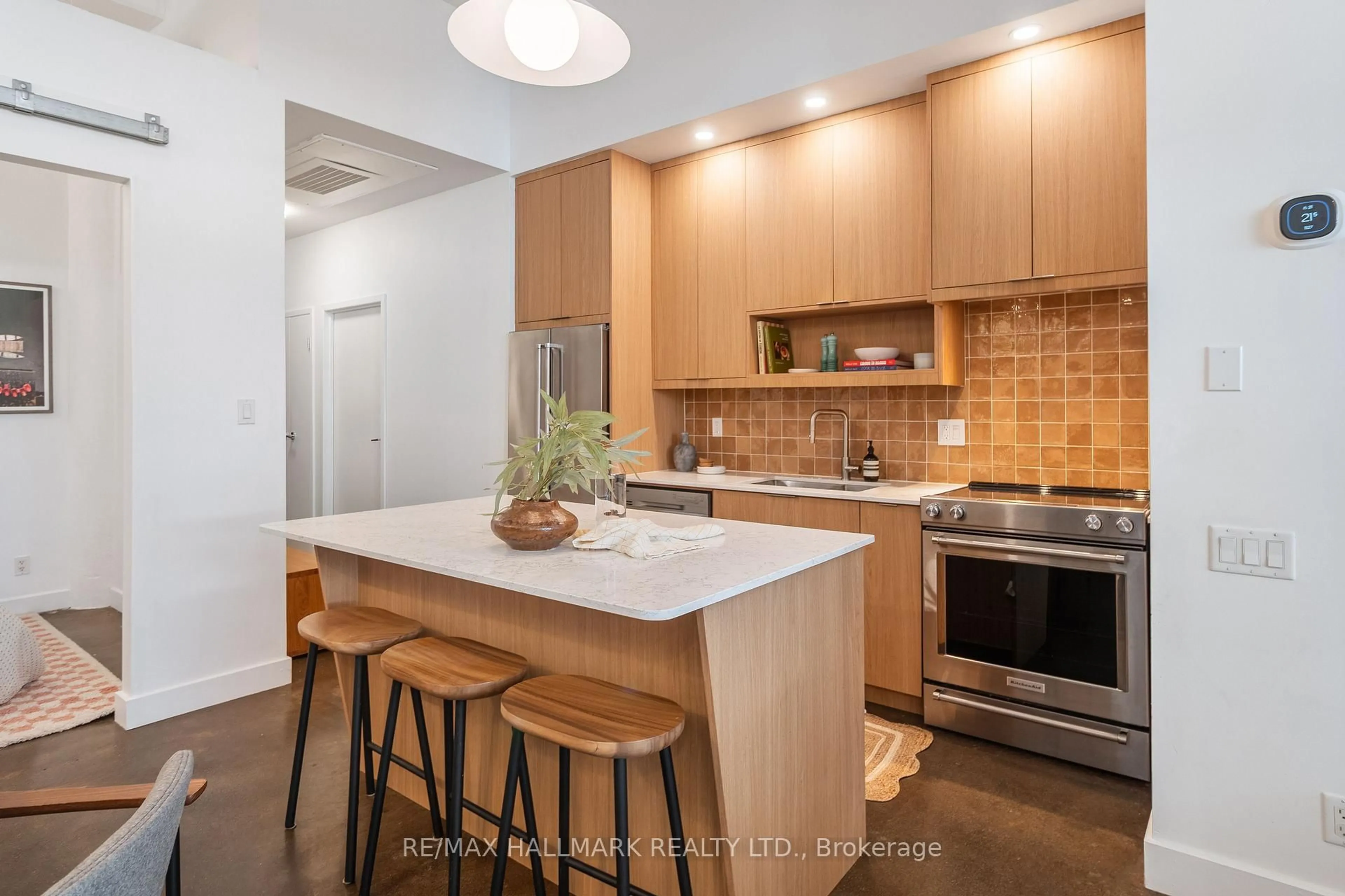 Open concept kitchen, ceramic/tile floor for 233 Carlaw Ave #406, Toronto Ontario M4M 3N6