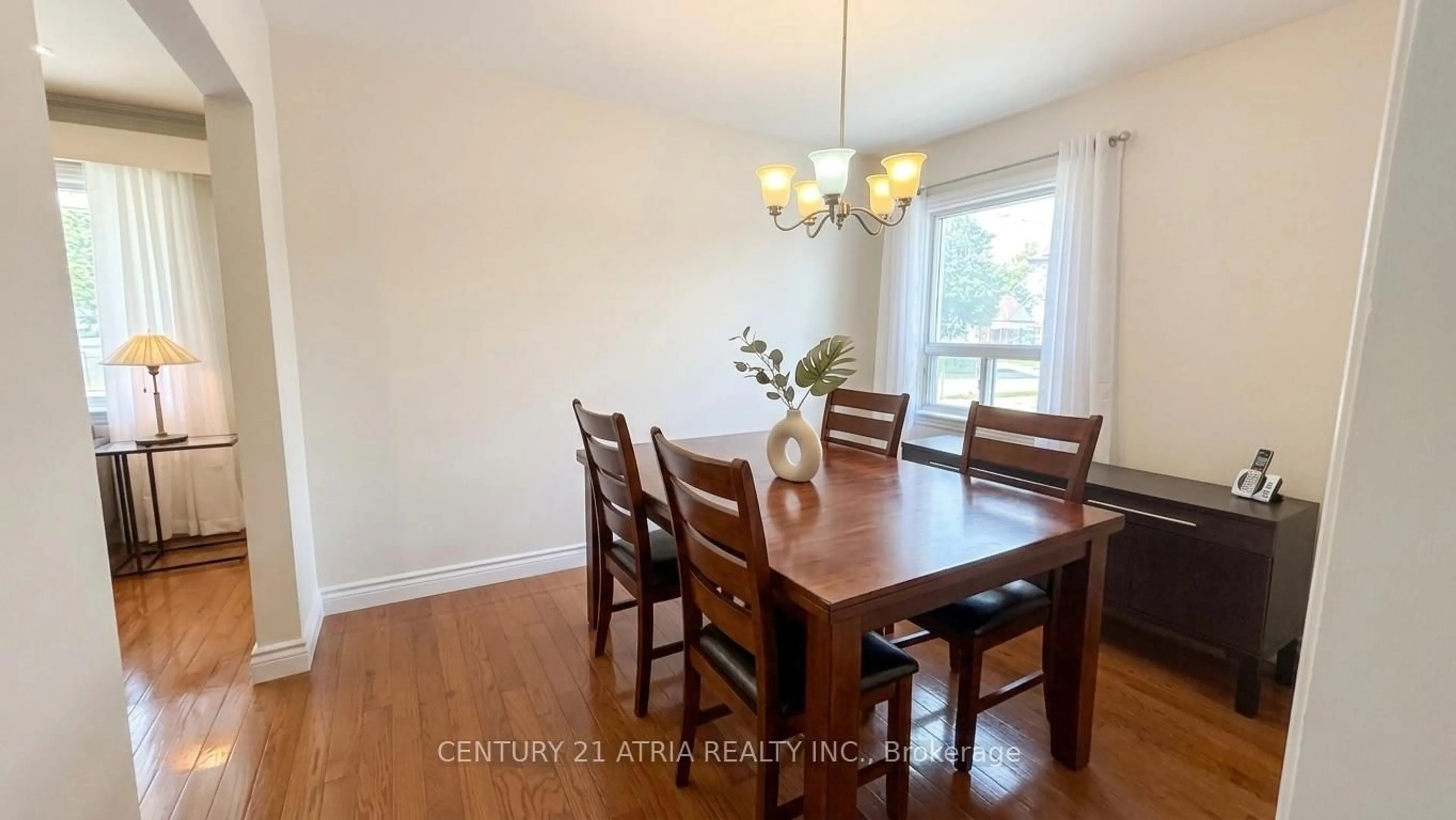 Dining room, wood/laminate floor for 115 Ellington Dr, Toronto Ontario M1R 3Y2