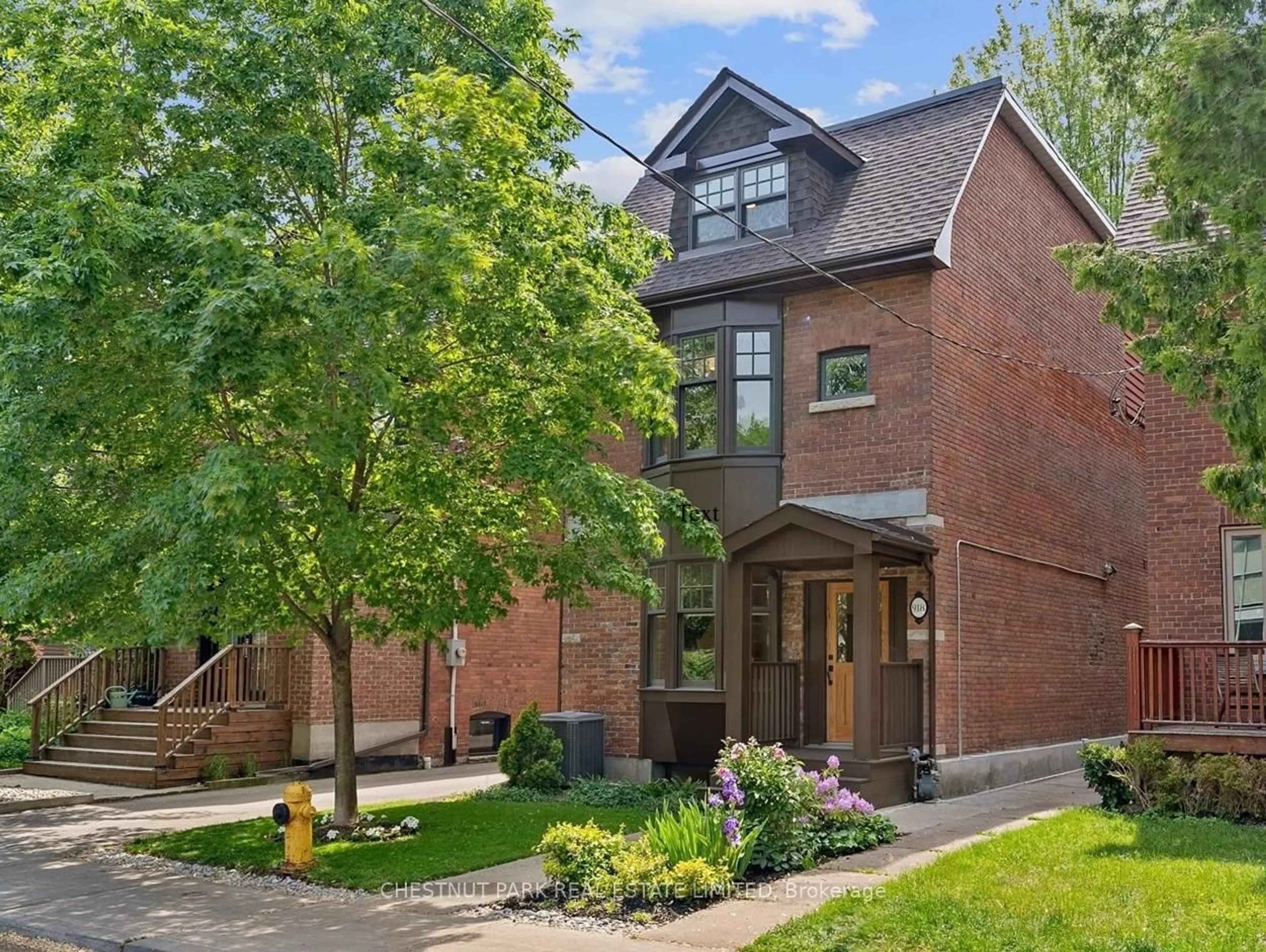 Home with brick exterior material, street for 918 Carlaw Ave, Toronto Ontario M4K 3L3