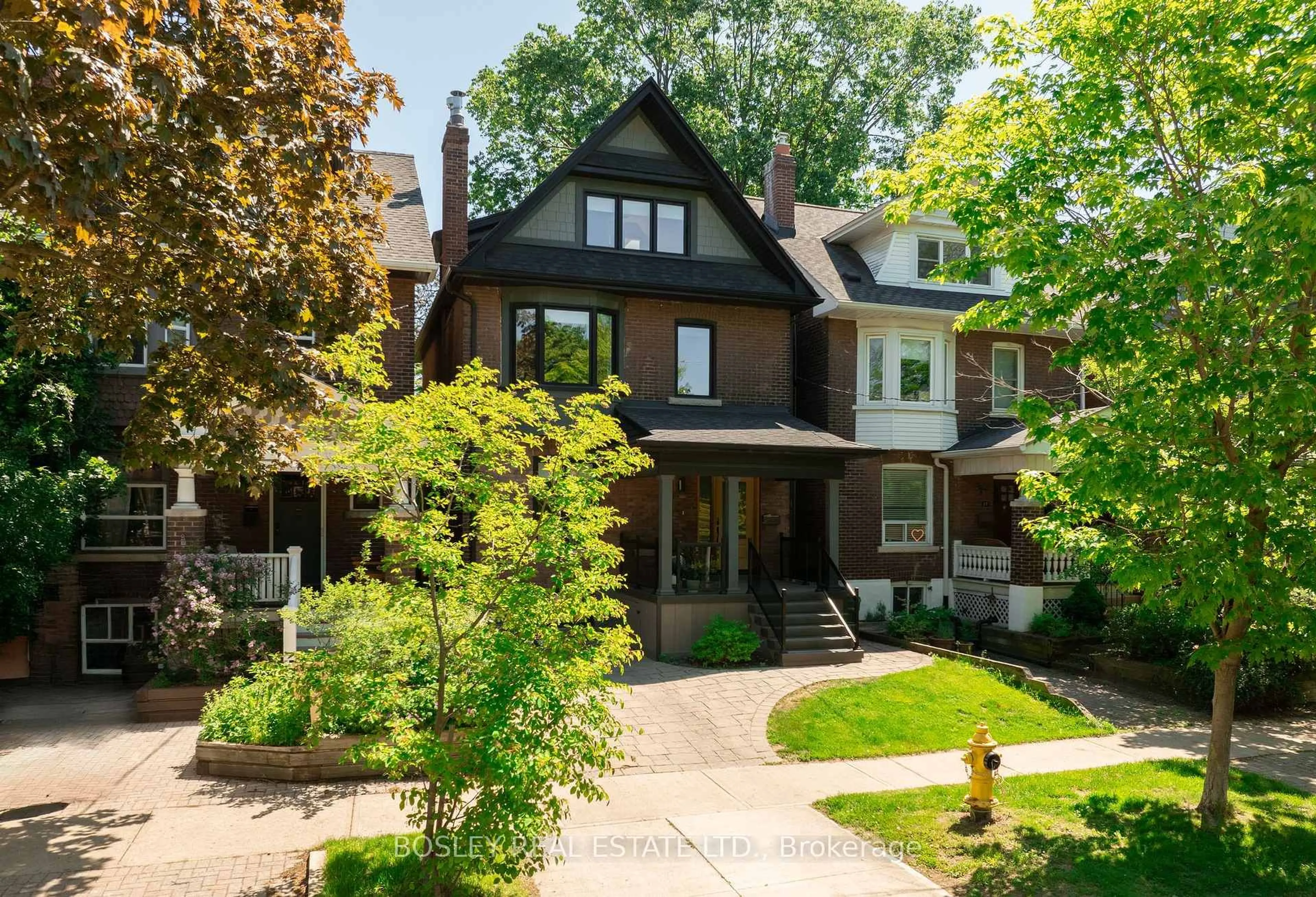 Home with brick exterior material, street for 19 Lark St, Toronto Ontario M4L 3M5