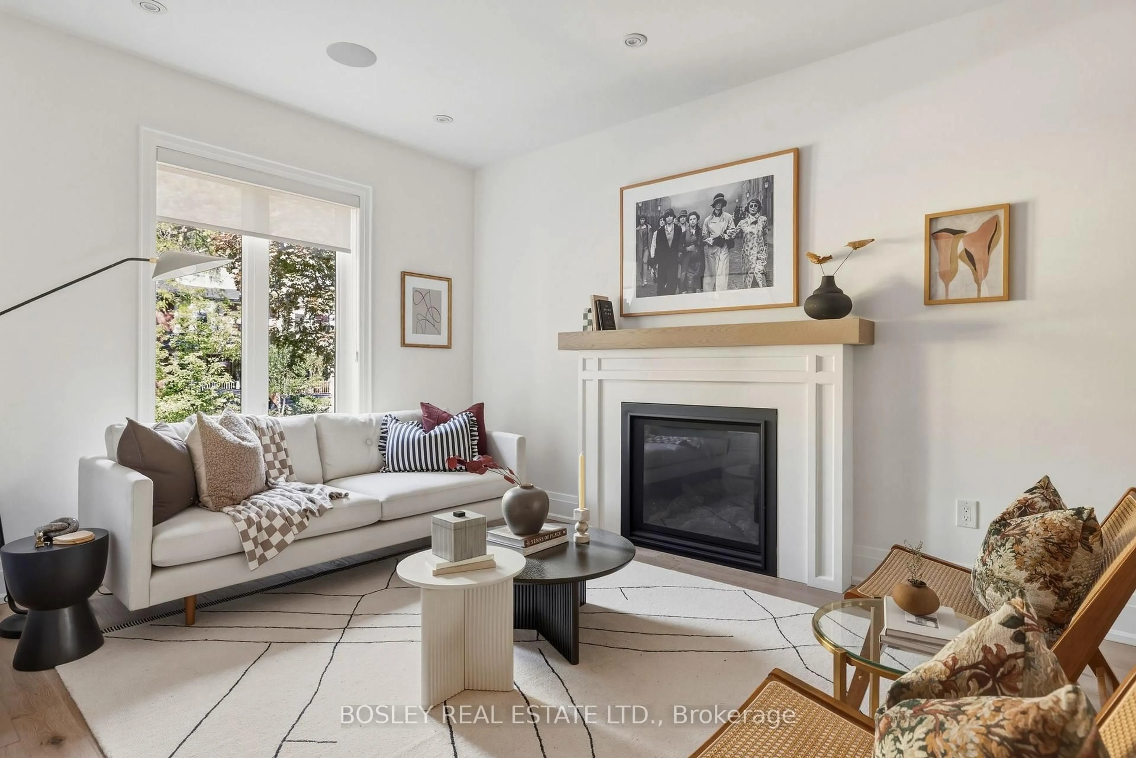Living room with furniture, ceramic/tile floor for 19 Lark St, Toronto Ontario M4L 3M5