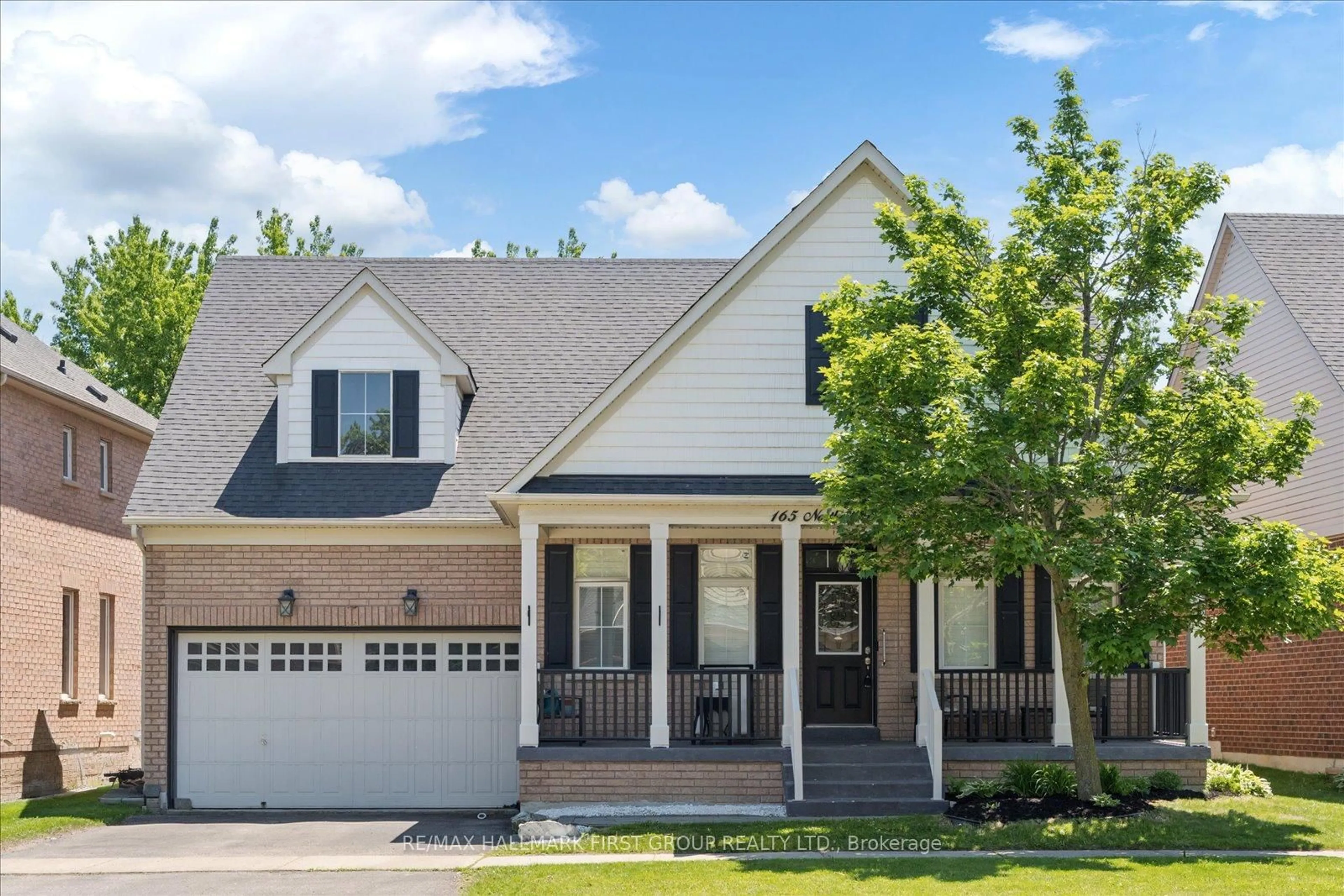 Home with brick exterior material, street for 165 Northern Dancer Dr, Oshawa Ontario L1L 0A3
