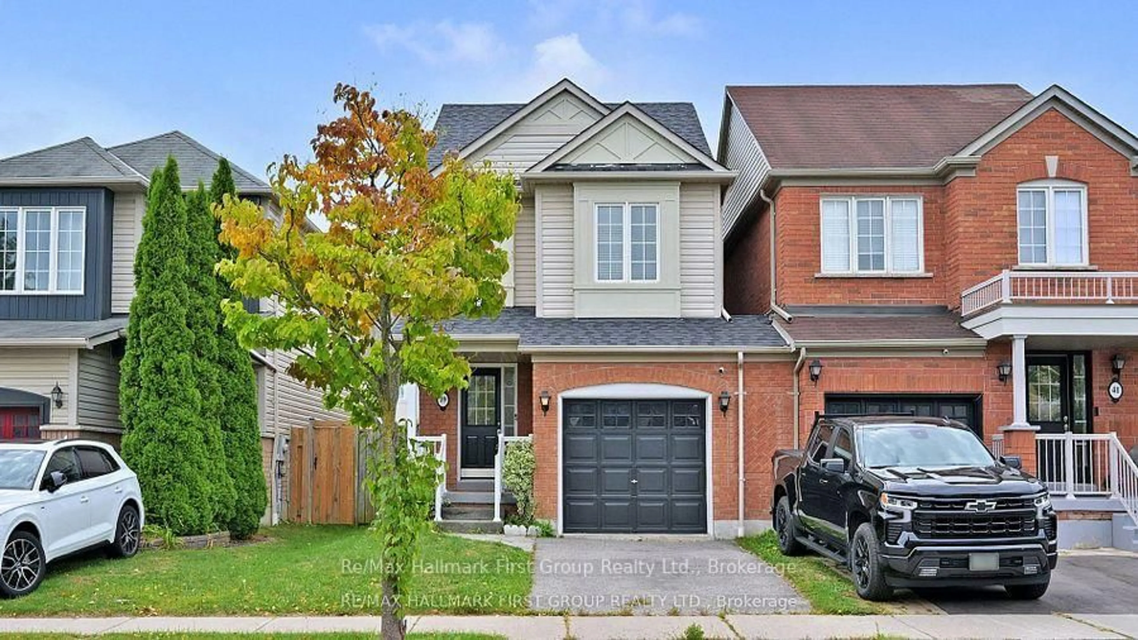 Home with brick exterior material, street for 39 Robideau Pl, Whitby Ontario L1R 3G6