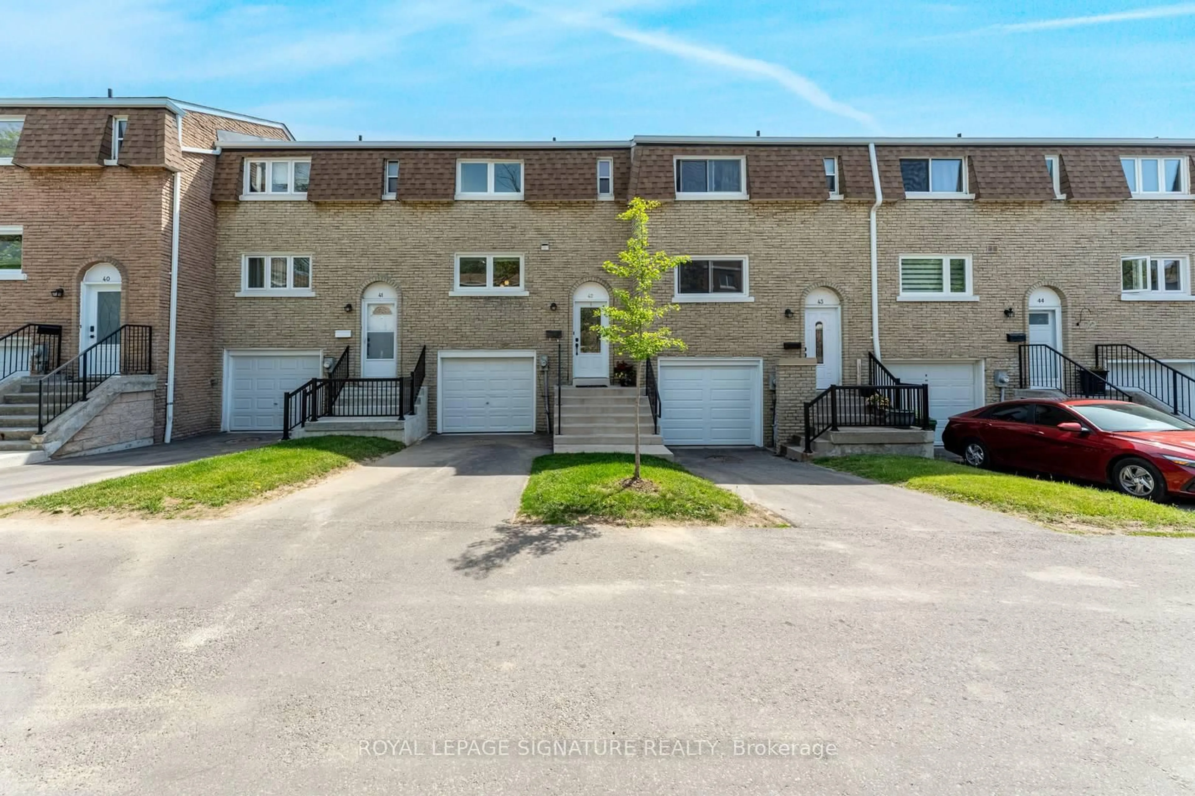 A pic from outside/outdoor area/front of a property/back of a property/a pic from drone, street for 121 Centennial Rd #42, Toronto Ontario M1C 1Z7