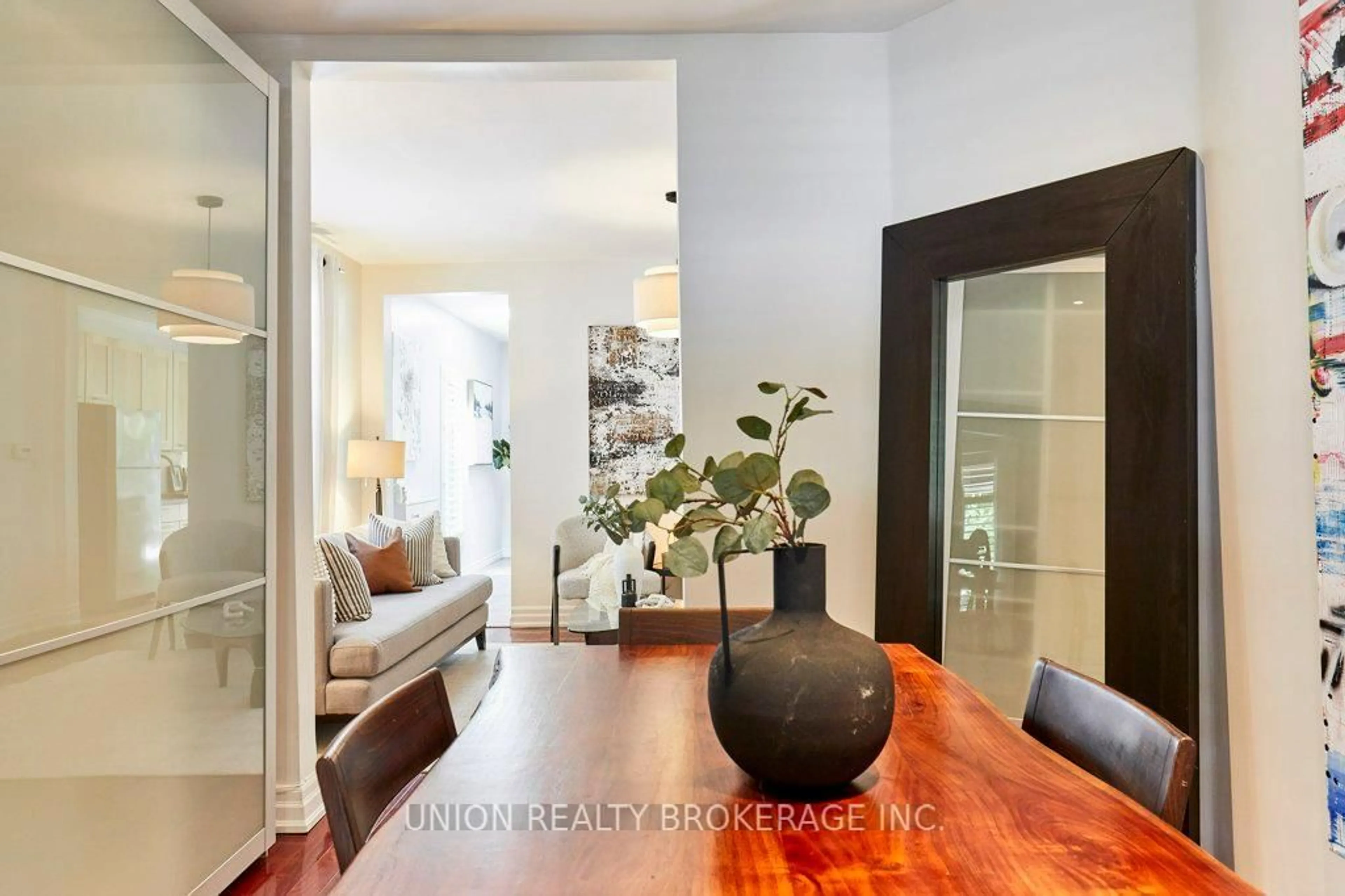 Dining room, wood/laminate floor for 285 Woodbine Ave, Toronto Ontario M4L 3P3