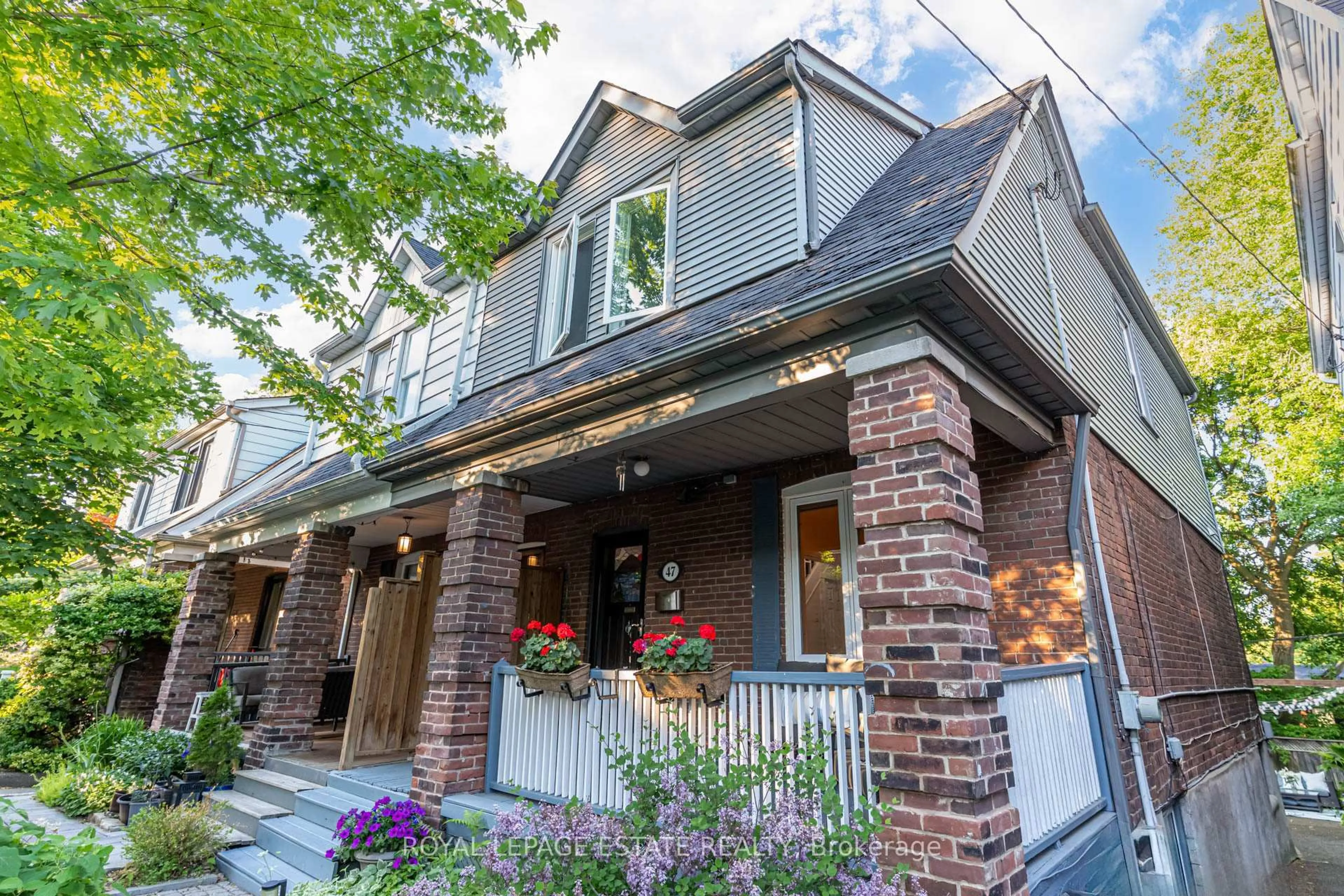 Home with brick exterior material, street for 47 Bowmore Rd, Toronto Ontario M4L 3H8
