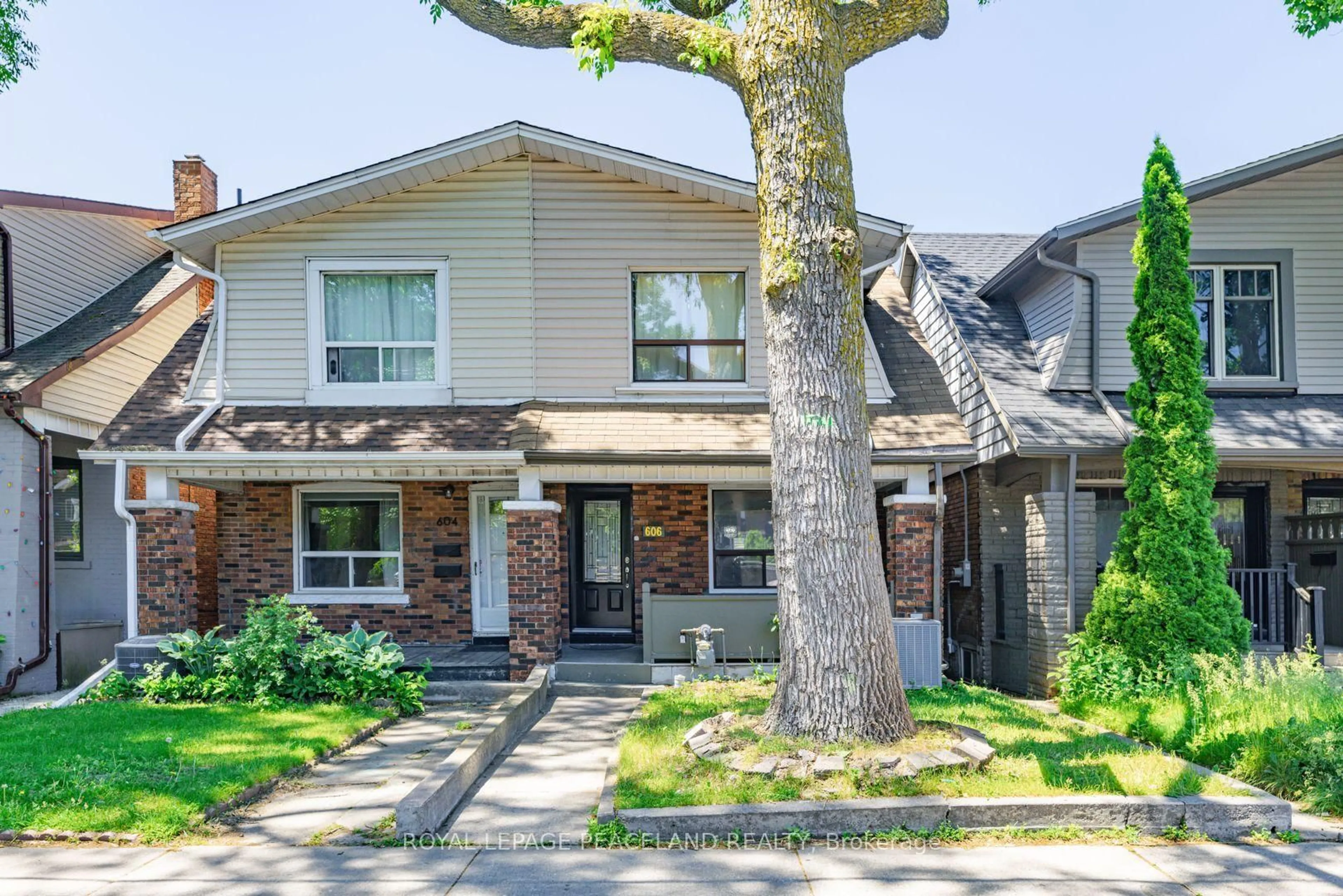 Home with brick exterior material, street for 606 Coxwell Ave, Toronto Ontario M4C 3B6