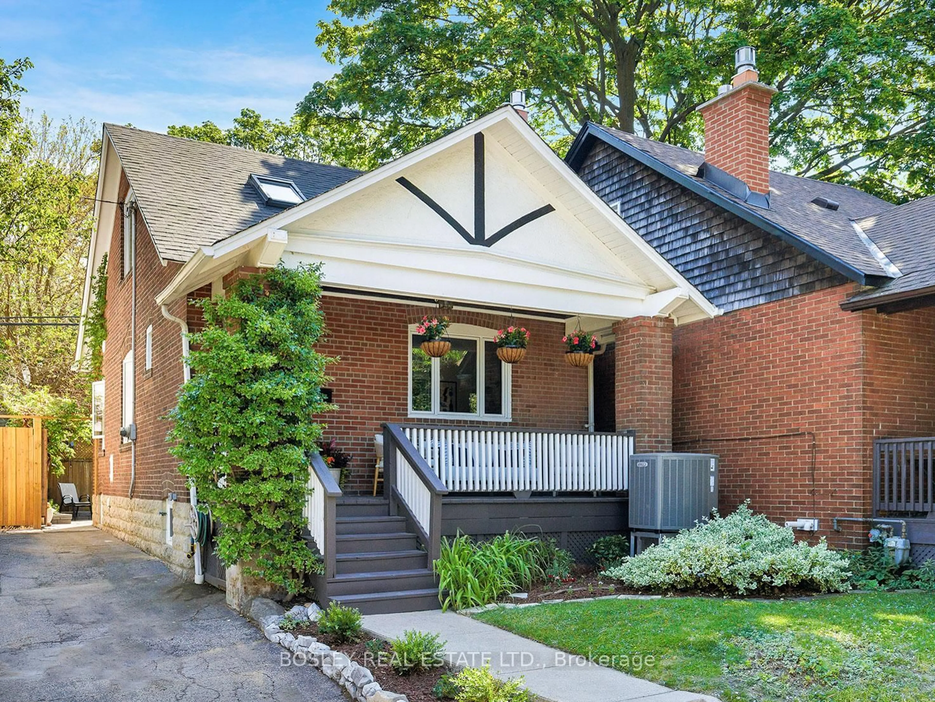 Home with brick exterior material, street for 249 Gainsborough Rd, Toronto Ontario M4L 3C7