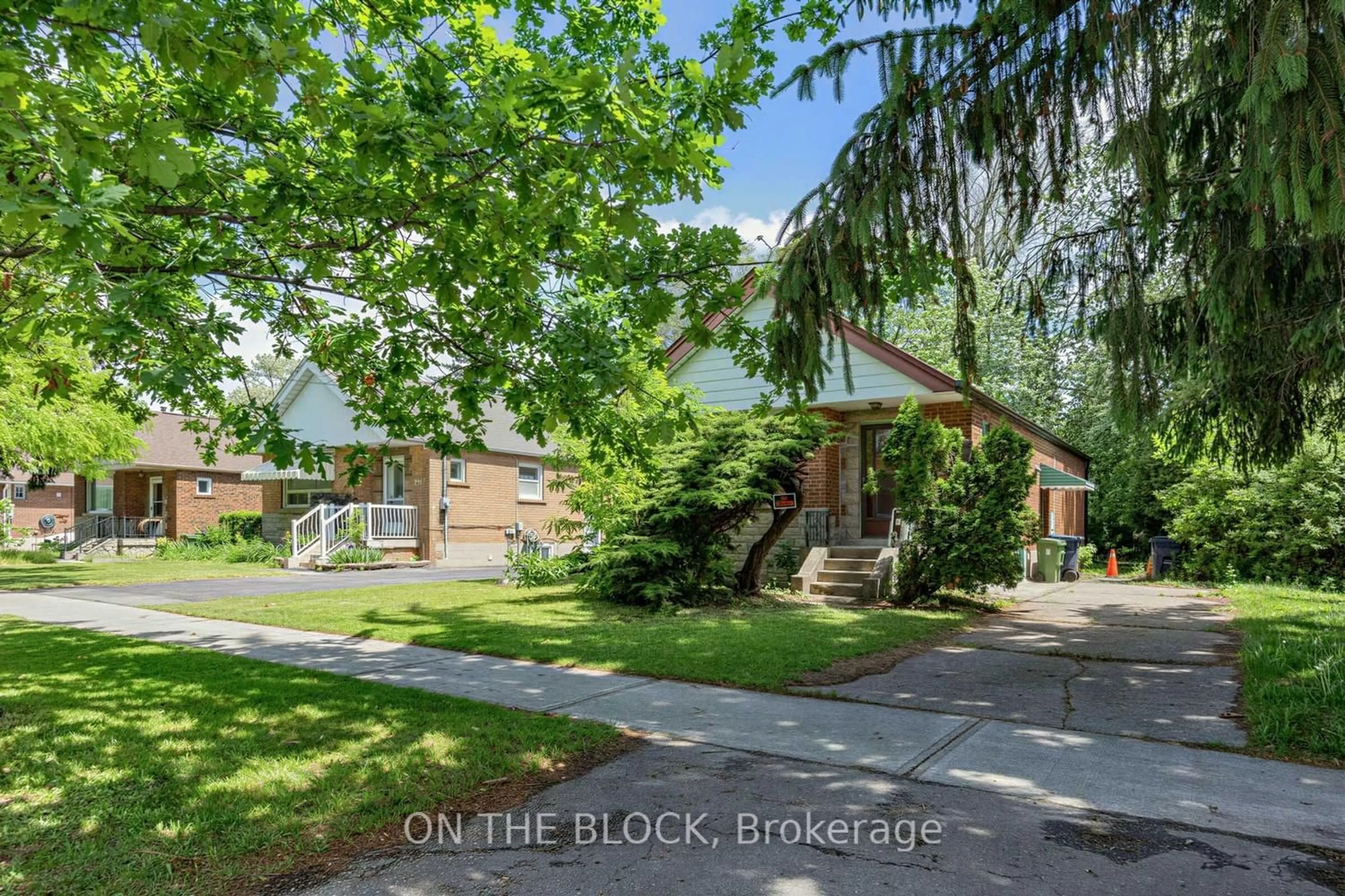 Home with brick exterior material, street for 729 Pharmacy Ave, Toronto Ontario M1L 3J4