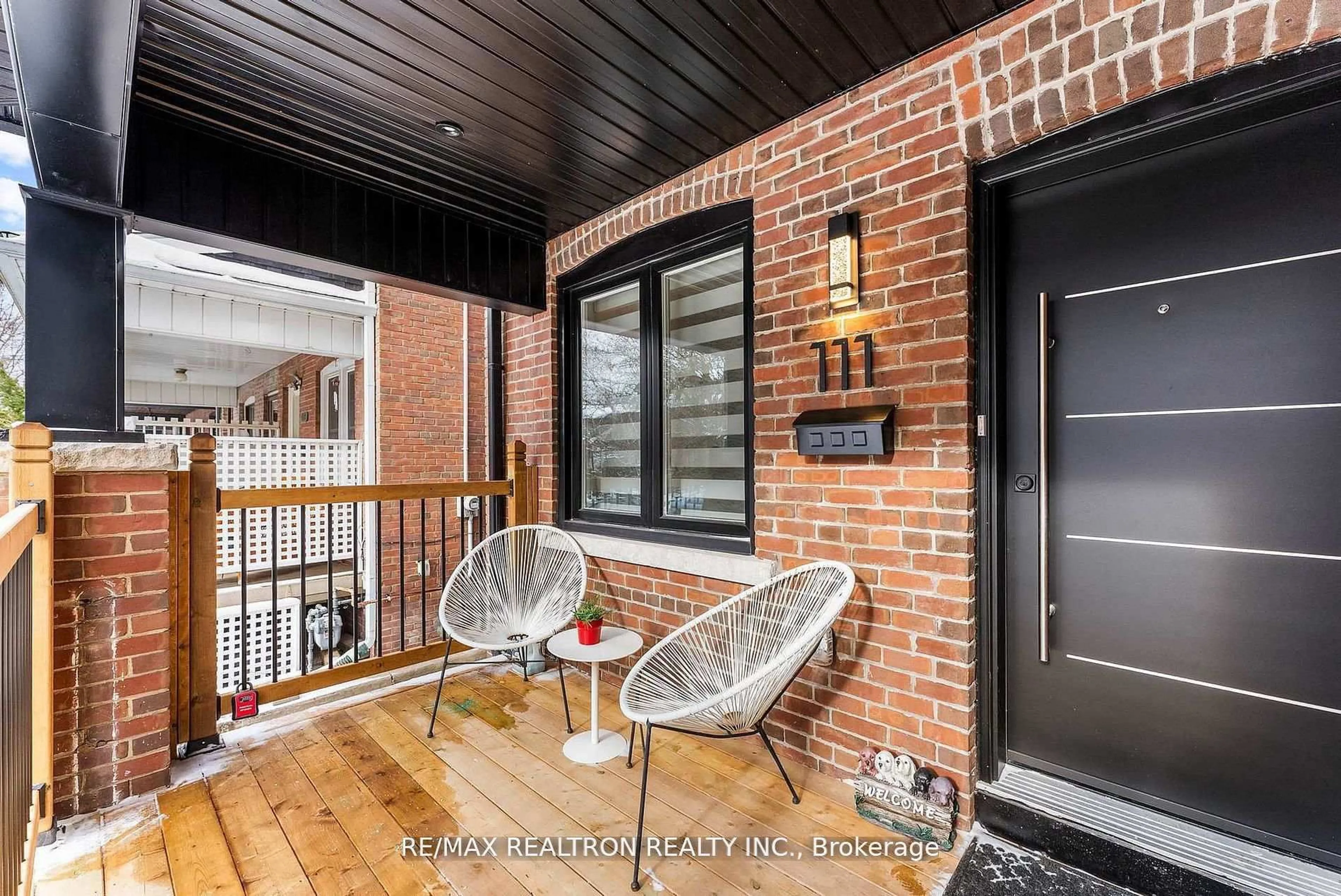Home with brick exterior material, street for 111 Glenmore Rd, Toronto Ontario M4L 3M2