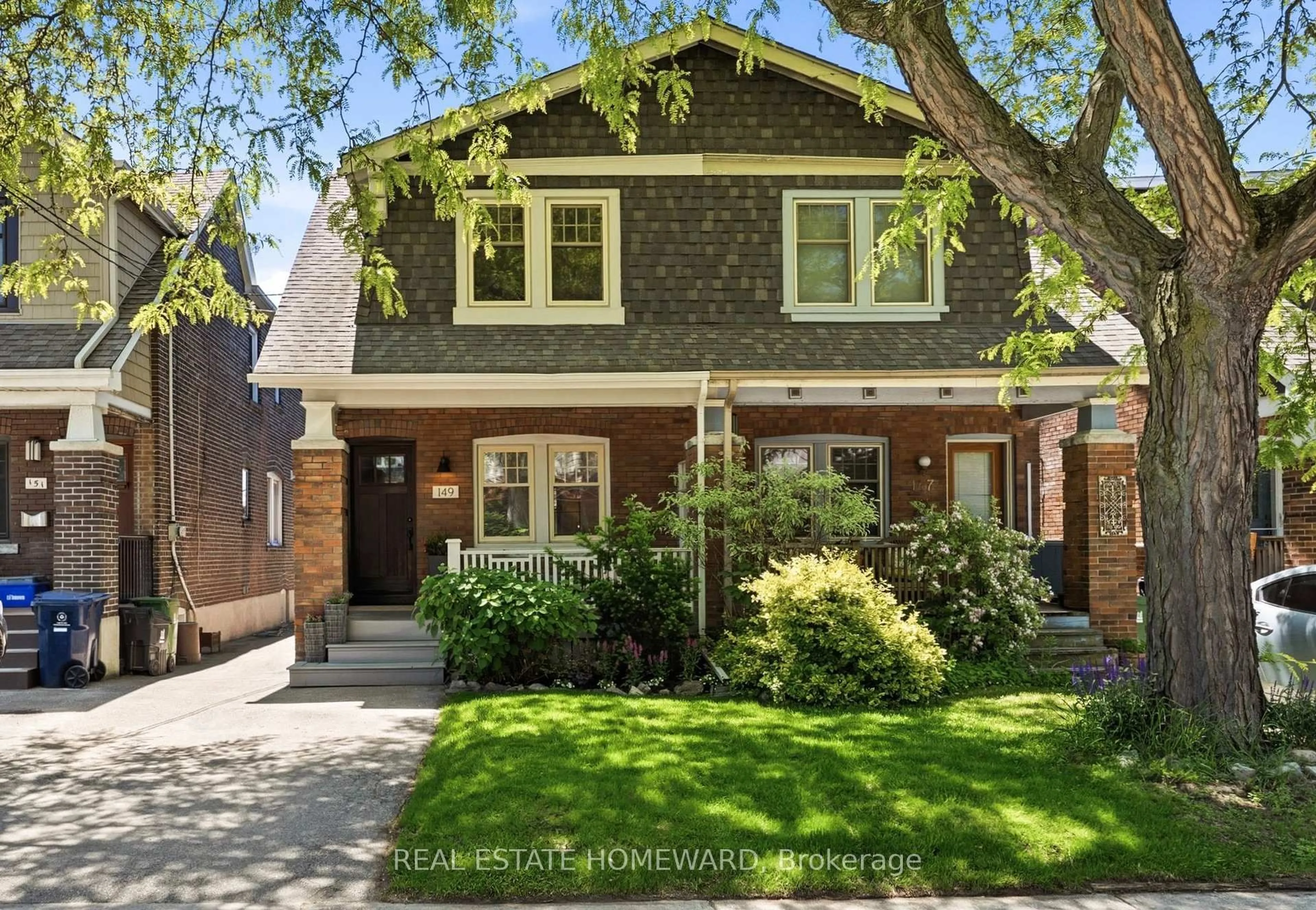 Home with brick exterior material, street for 149 Wolverleigh Blvd, Toronto Ontario M4J 1R8