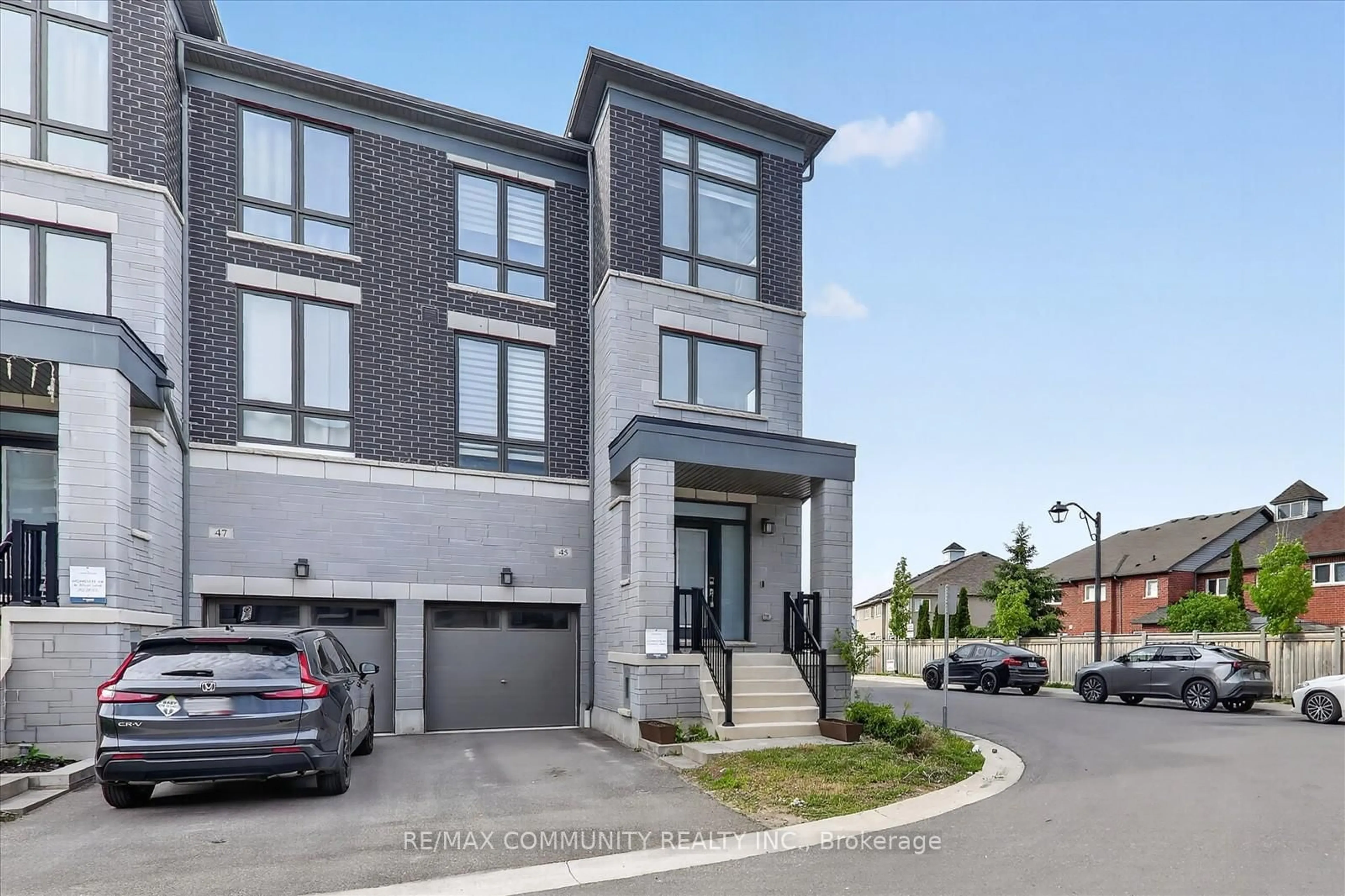 Home with brick exterior material, street for 45 Douet Lane, Ajax Ontario L1Z 0V4