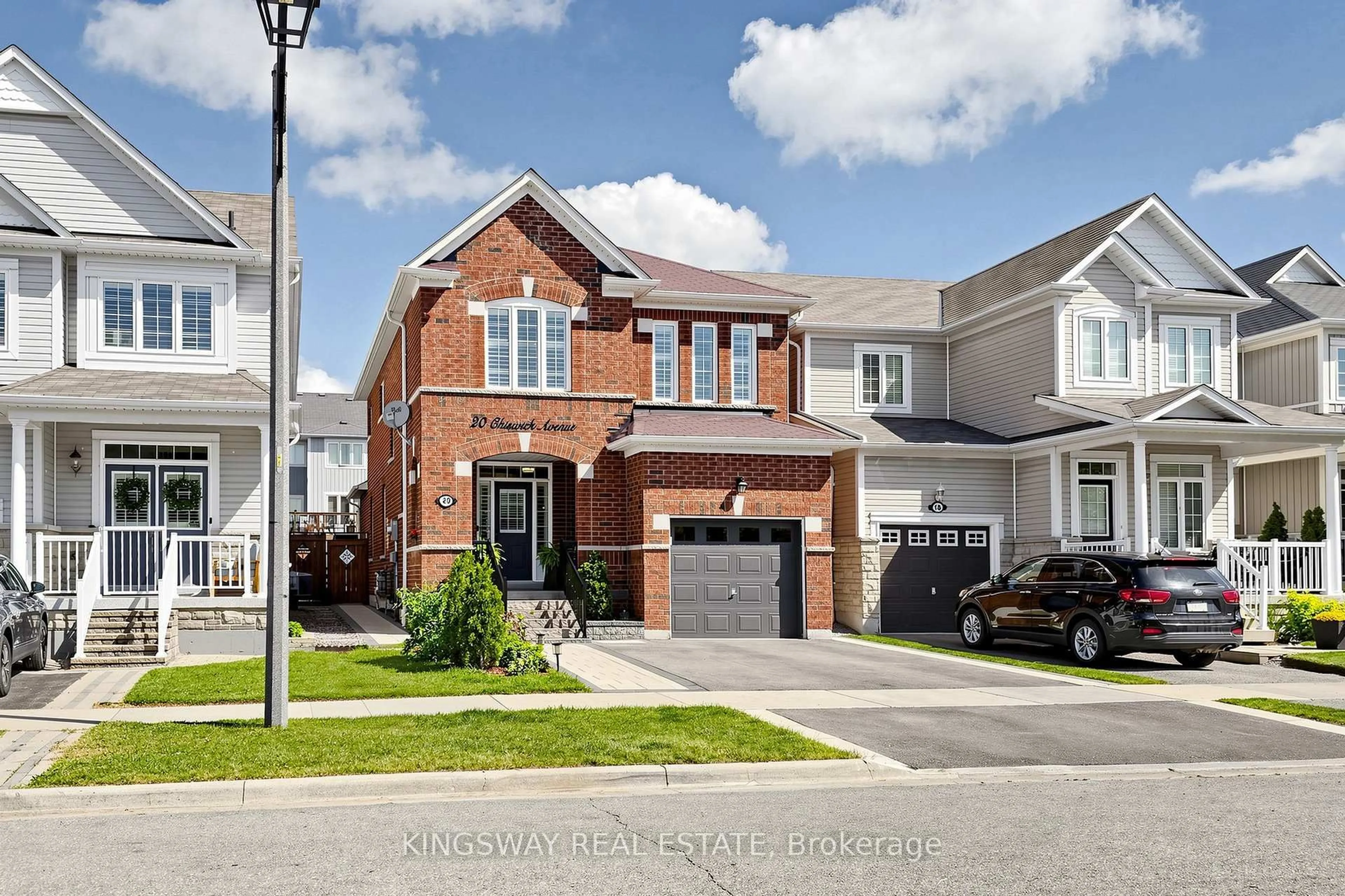 Home with brick exterior material, street for 20 Chiswick Ave, Whitby Ontario L1M 0E1