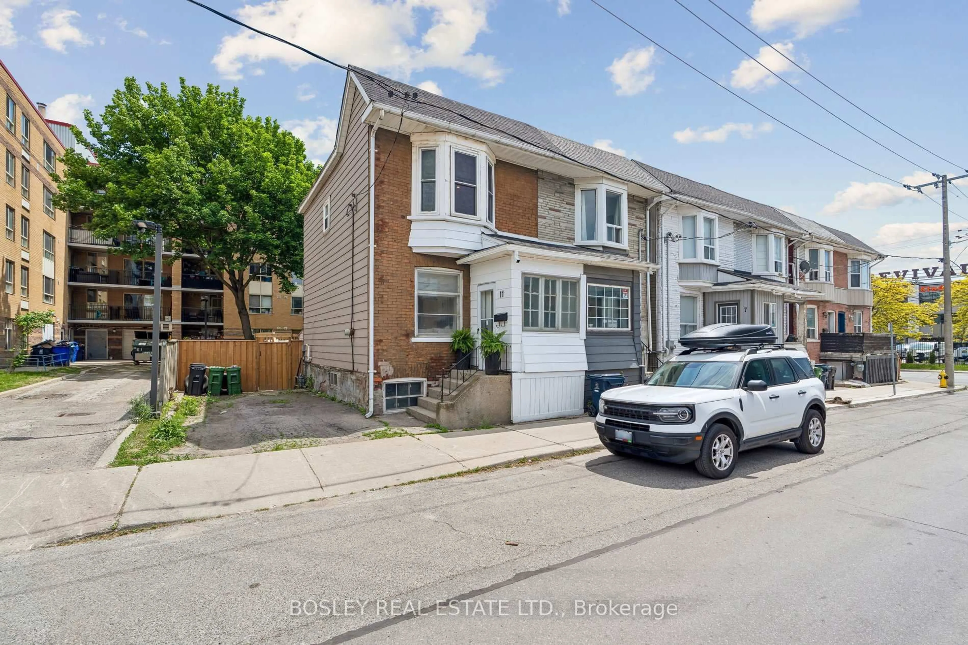 A pic from outside/outdoor area/front of a property/back of a property/a pic from drone, street for 11 Pape Ave, Toronto Ontario M4M 2V5