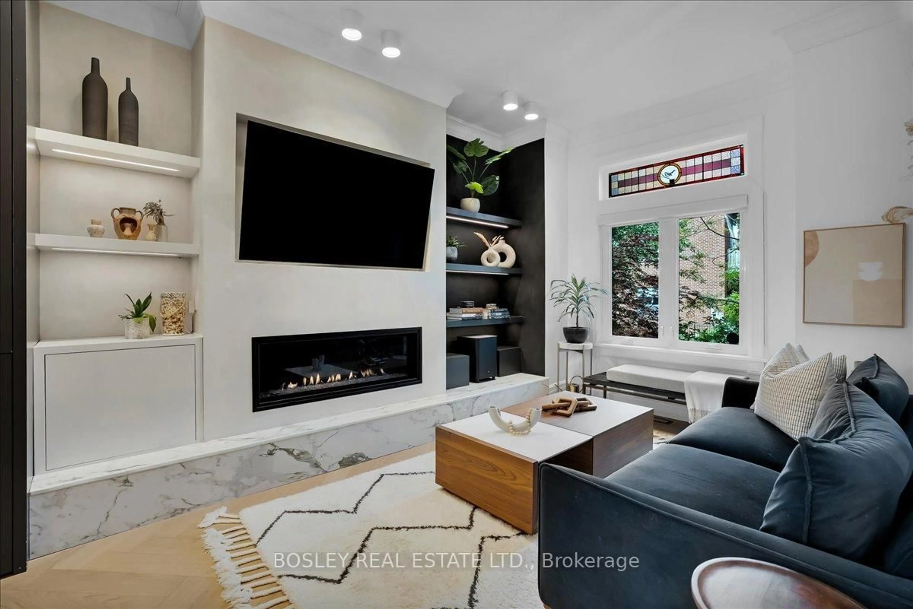 Living room with furniture, ceramic/tile floor for 372 Logan Ave, Toronto Ontario M4M 2N8