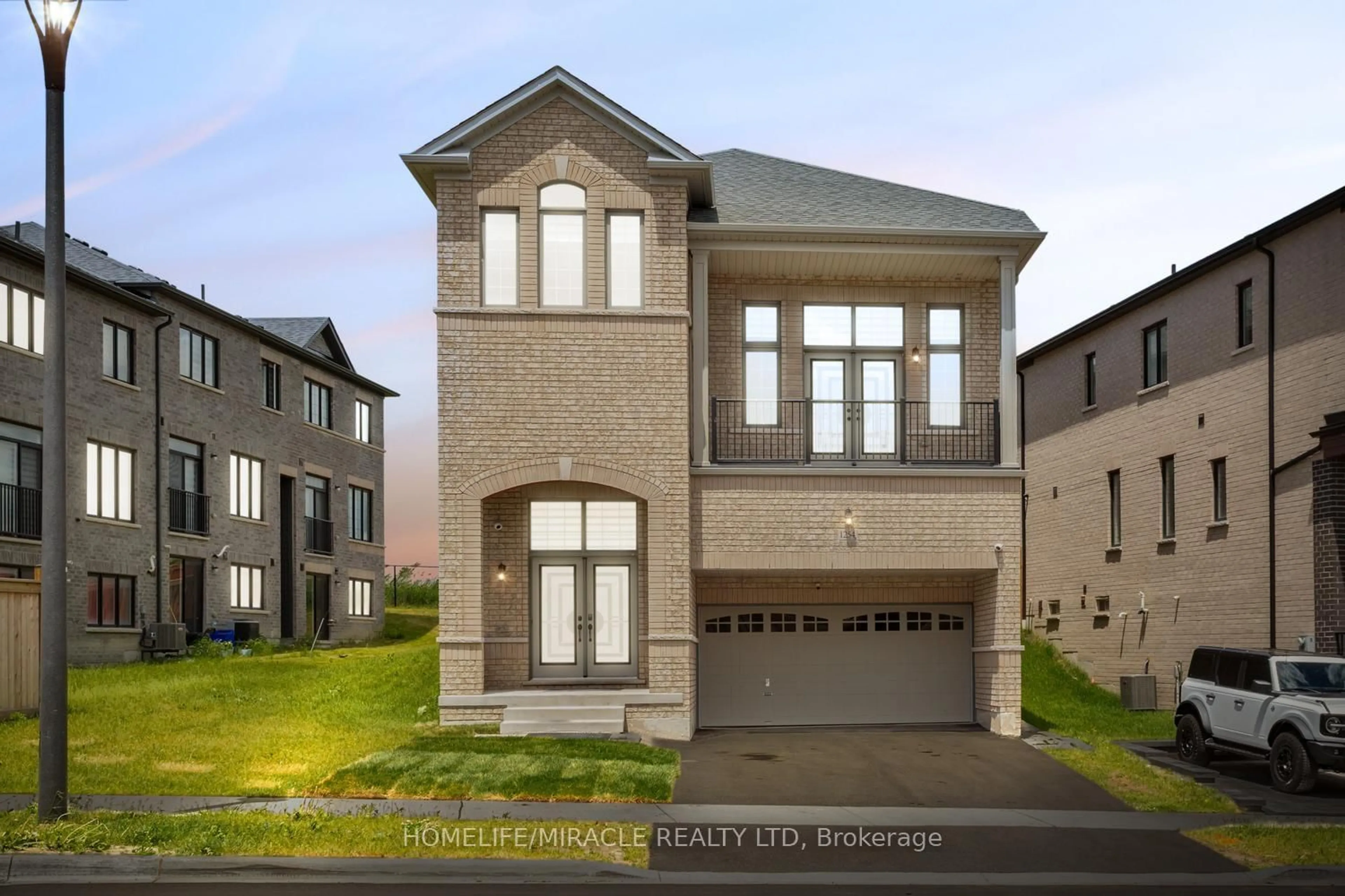 Home with brick exterior material, street for 1254 Aquarius Tr, Pickering Ontario L1X 0L9
