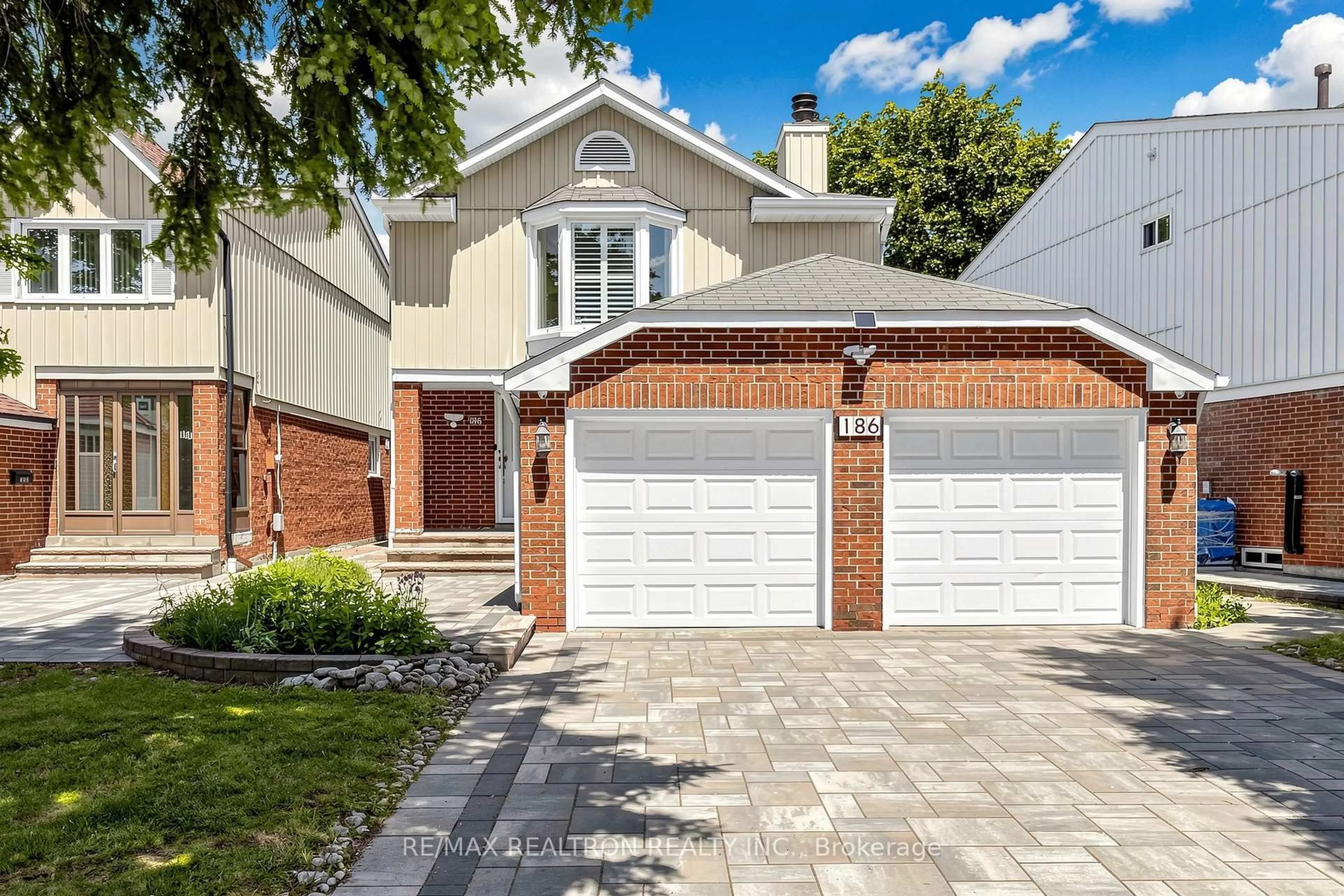 Home with brick exterior material, street for 186 Wintermute Blvd, Toronto Ontario M1W 3L5