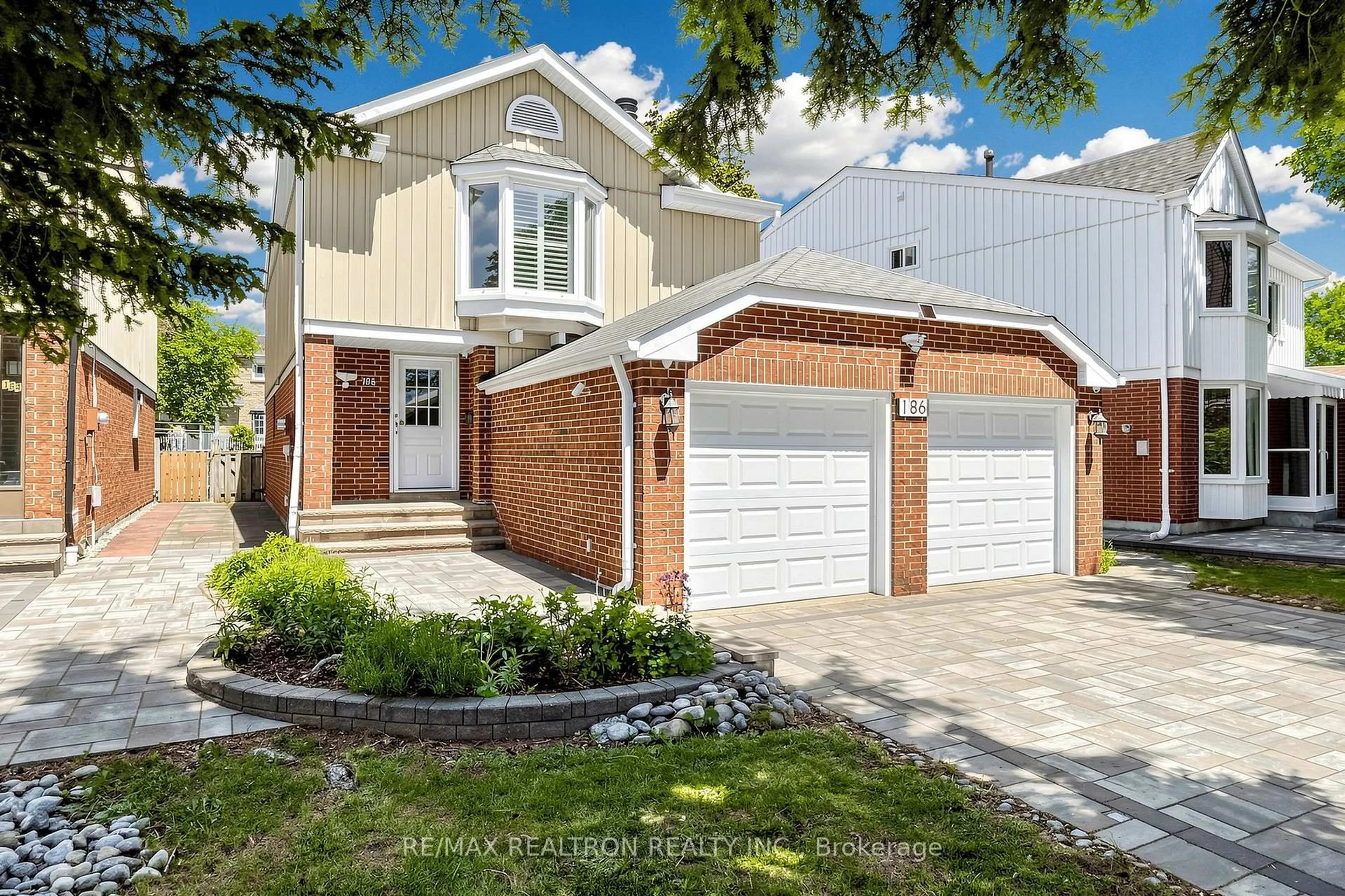 Home with brick exterior material, street for 186 Wintermute Blvd, Toronto Ontario M1W 3L5