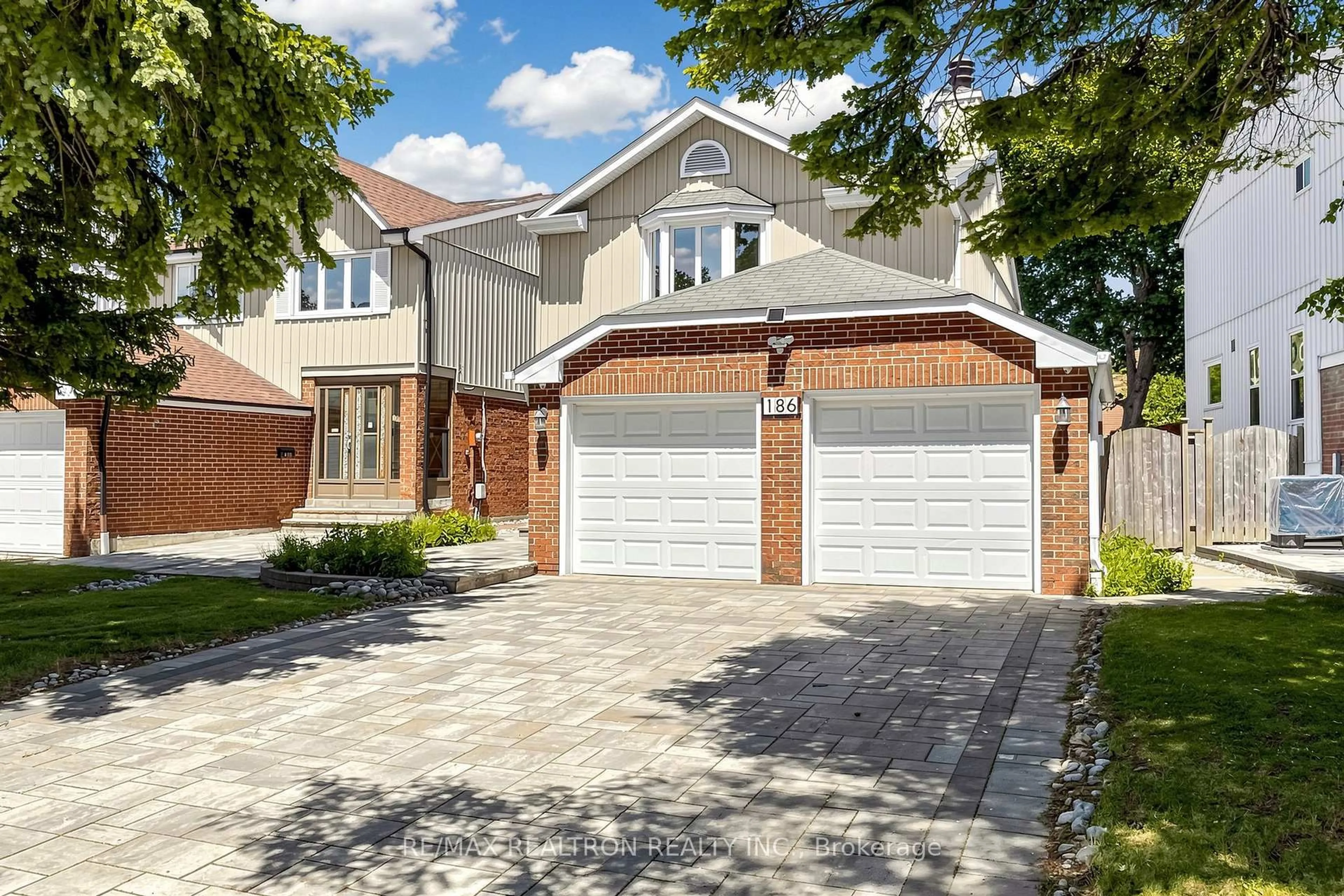 Home with brick exterior material, street for 186 Wintermute Blvd, Toronto Ontario M1W 3L5